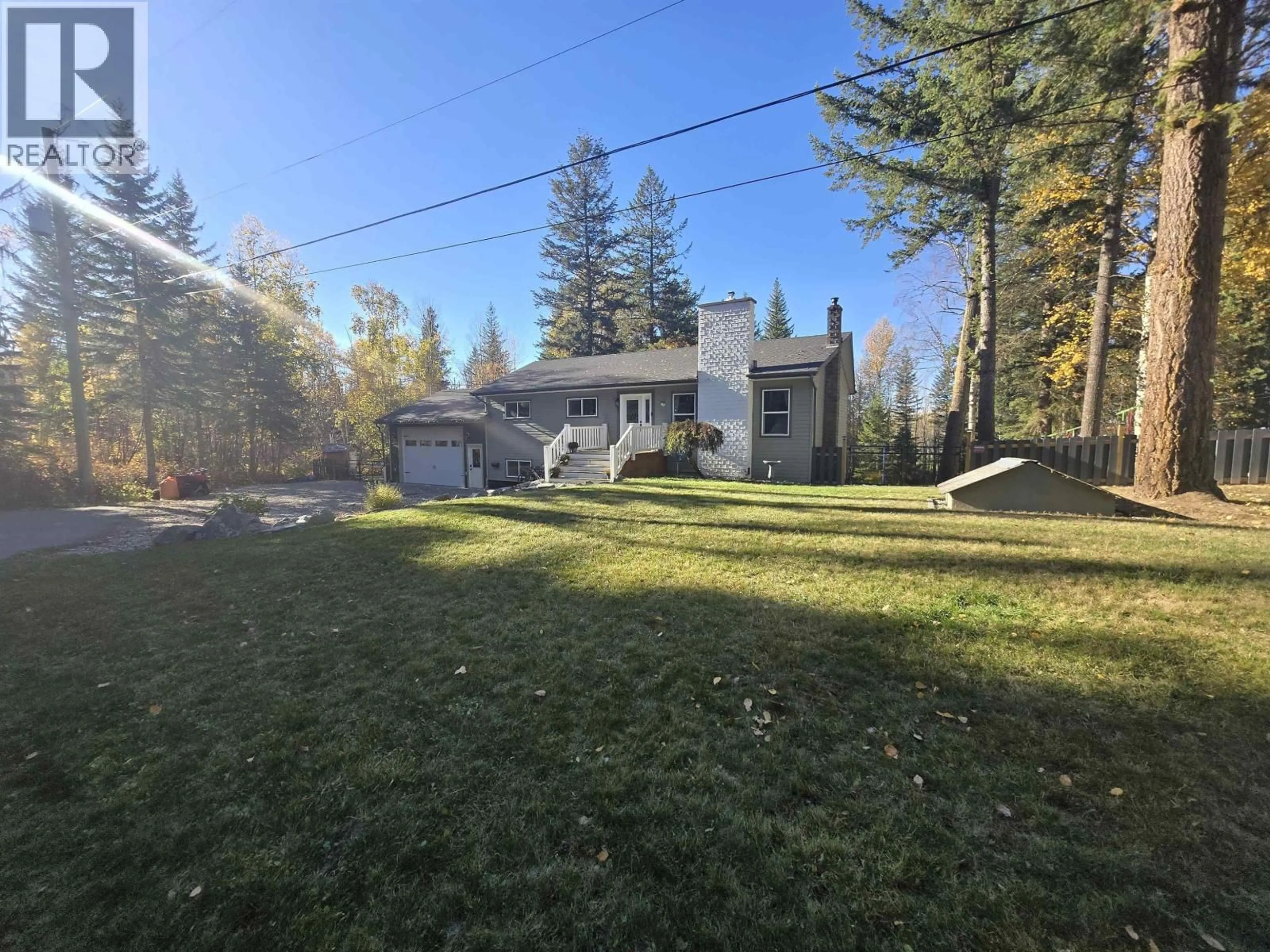 A pic from outside/outdoor area/front of a property/back of a property/a pic from drone, forest/trees view for 1361 OAK AVENUE, Quesnel British Columbia V2J5L4