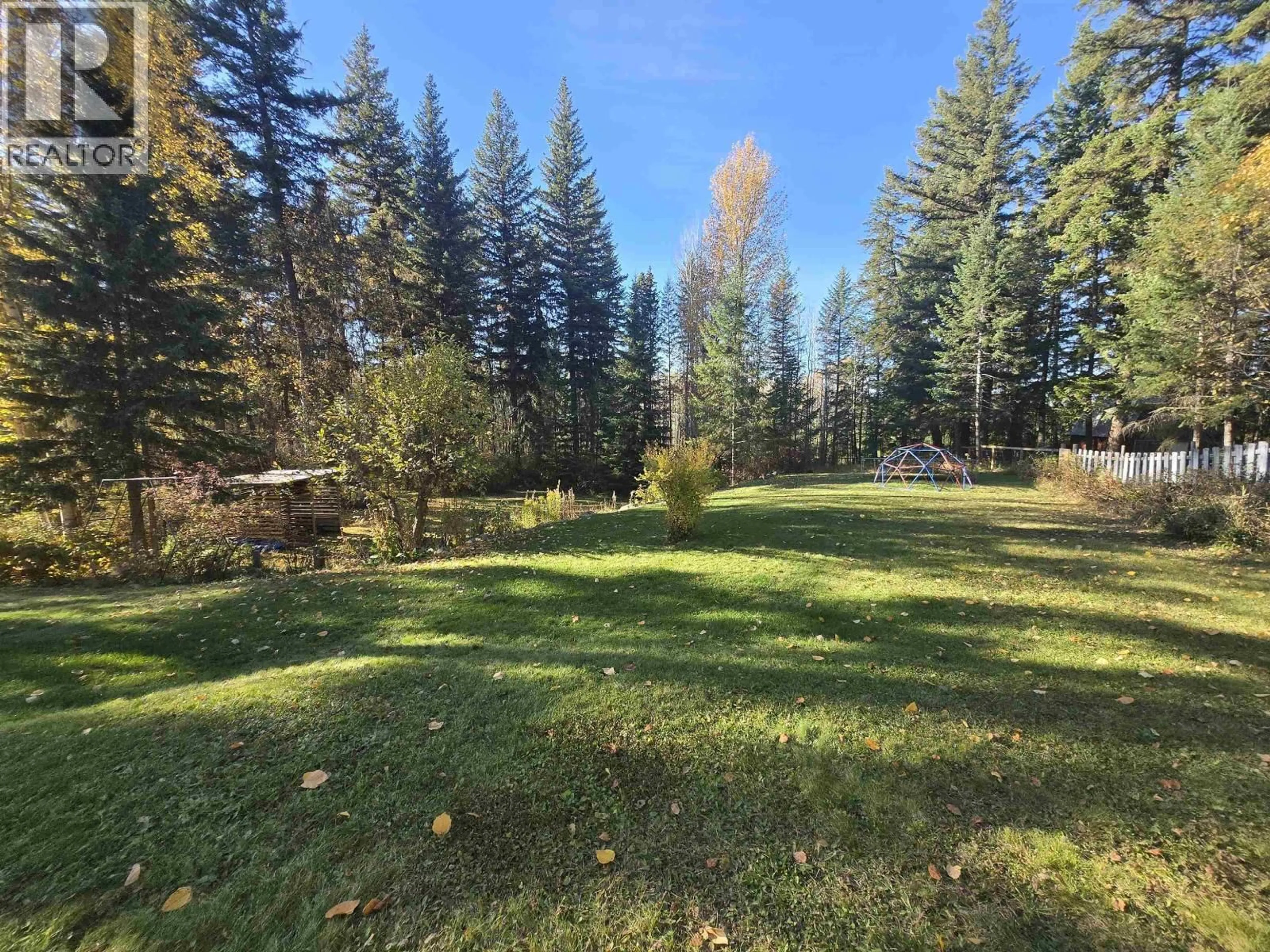 A pic from outside/outdoor area/front of a property/back of a property/a pic from drone, forest/trees view for 1361 OAK AVENUE, Quesnel British Columbia V2J5L4