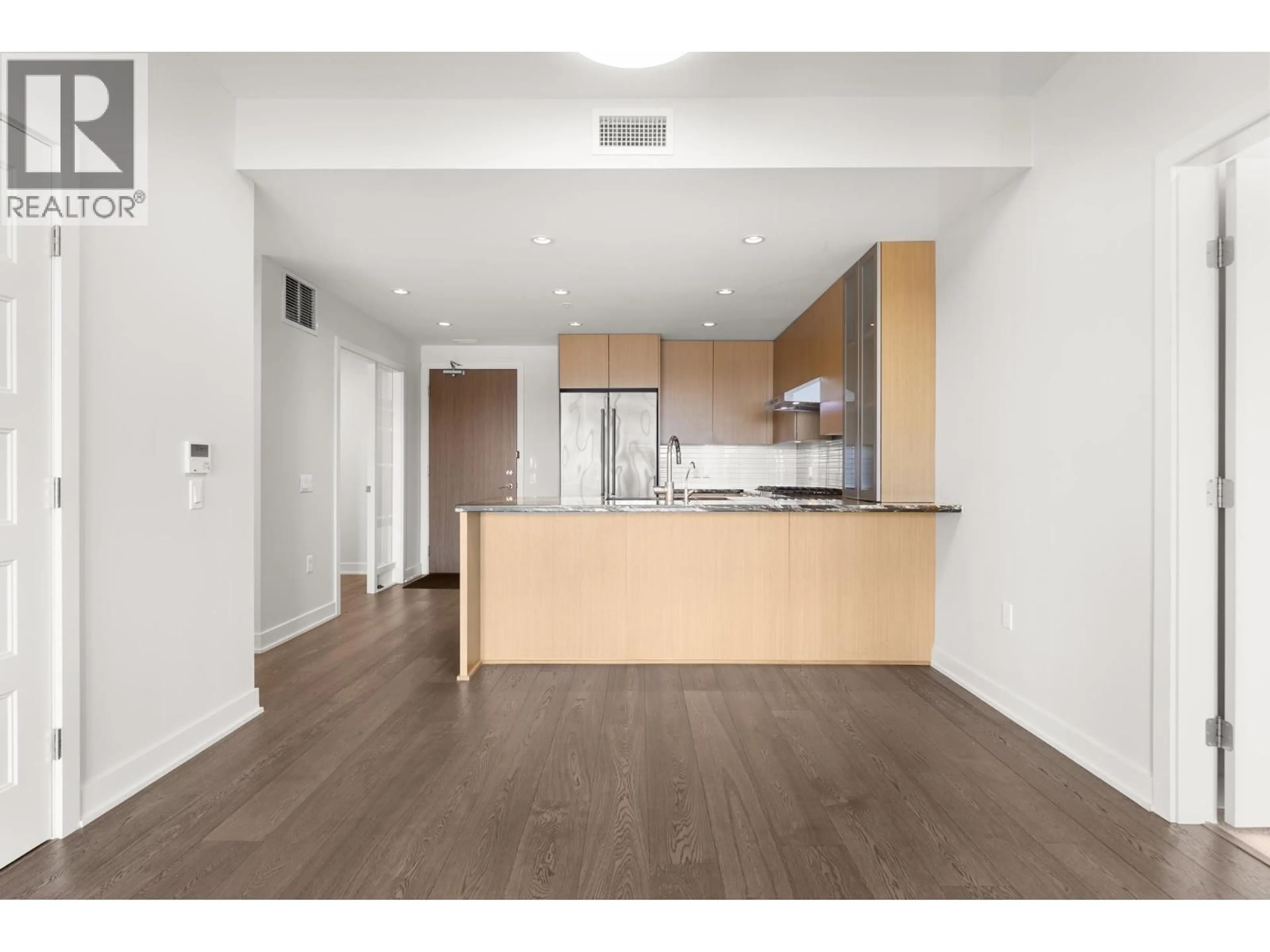 Open concept kitchen, wood/laminate floor for 209 - 6160 LONDON ROAD, Richmond British Columbia V7E4J2