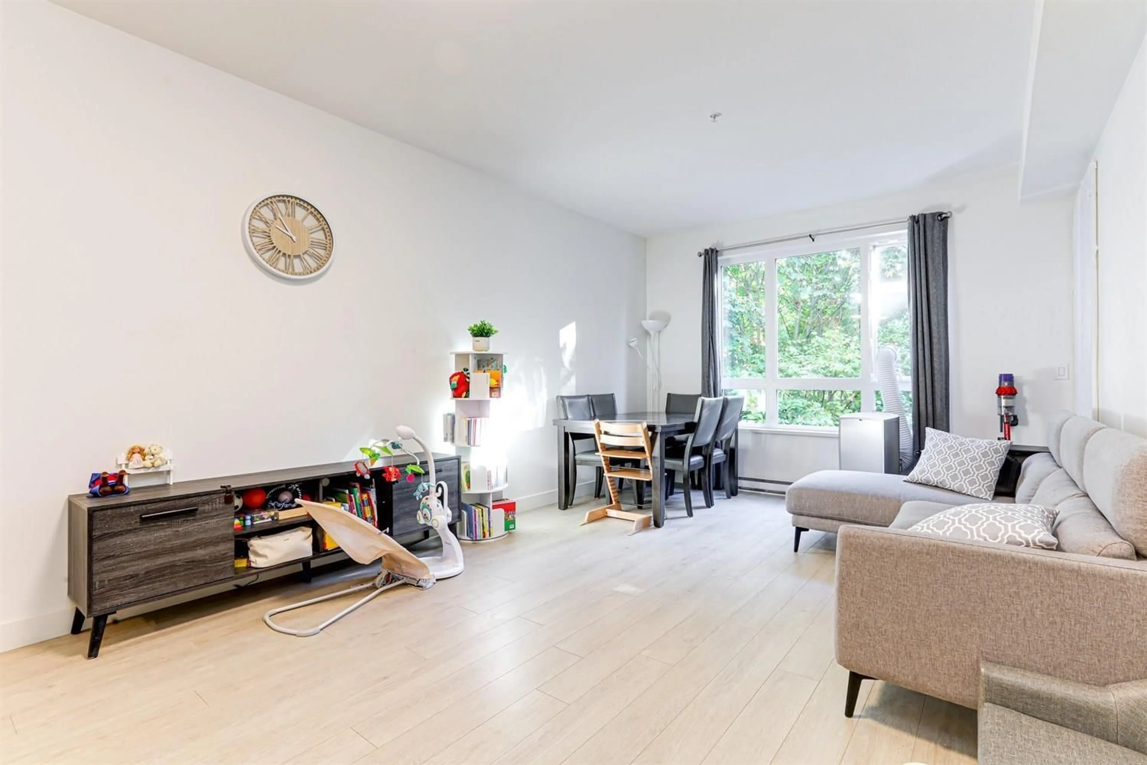 Living room with furniture, floor is not visible for 205 - 13925 FRASER, Surrey British Columbia V3T4E6