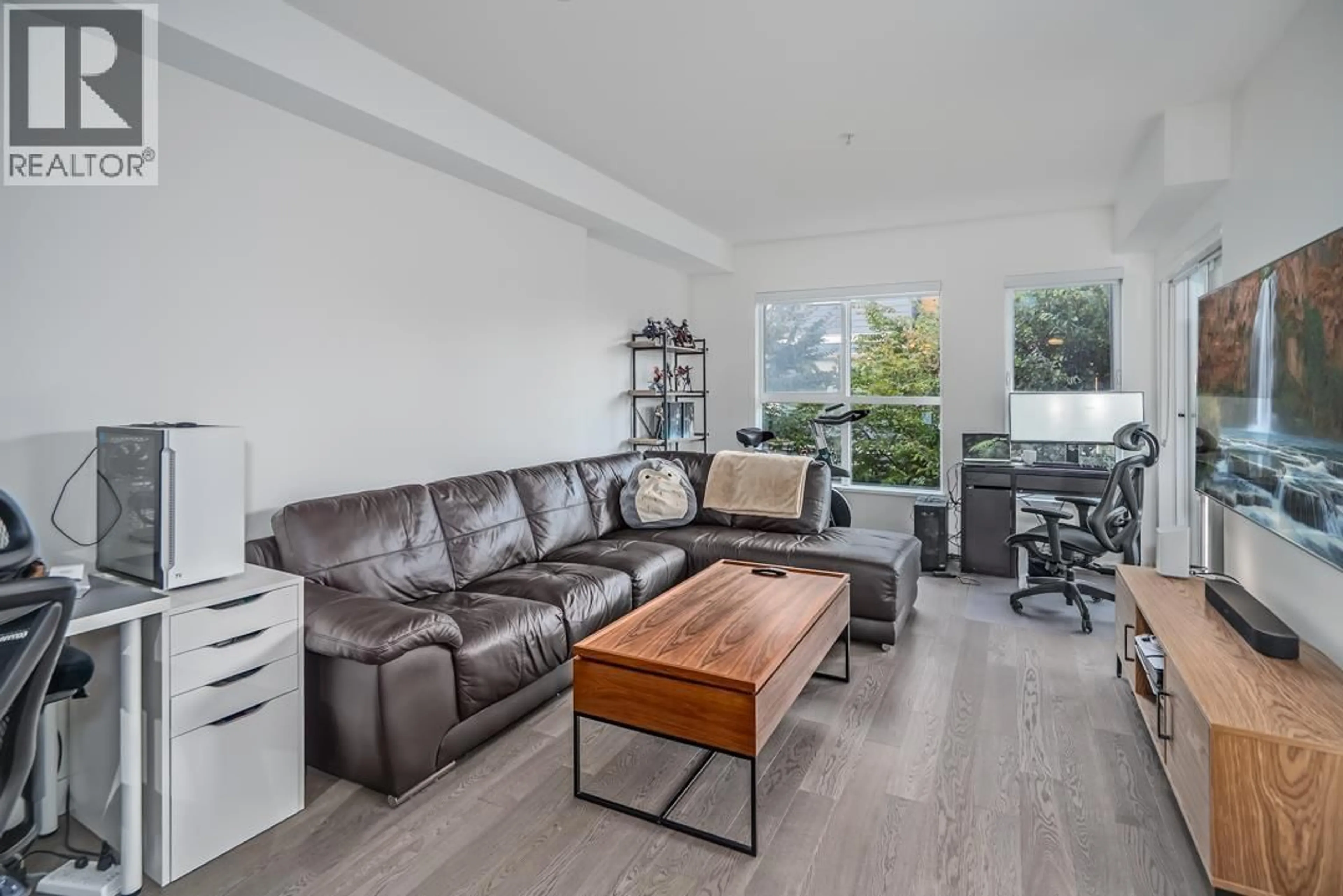 Living room with furniture, wood/laminate floor for 208 - 10177 RIVER DRIVE, Richmond British Columbia V6X0S2