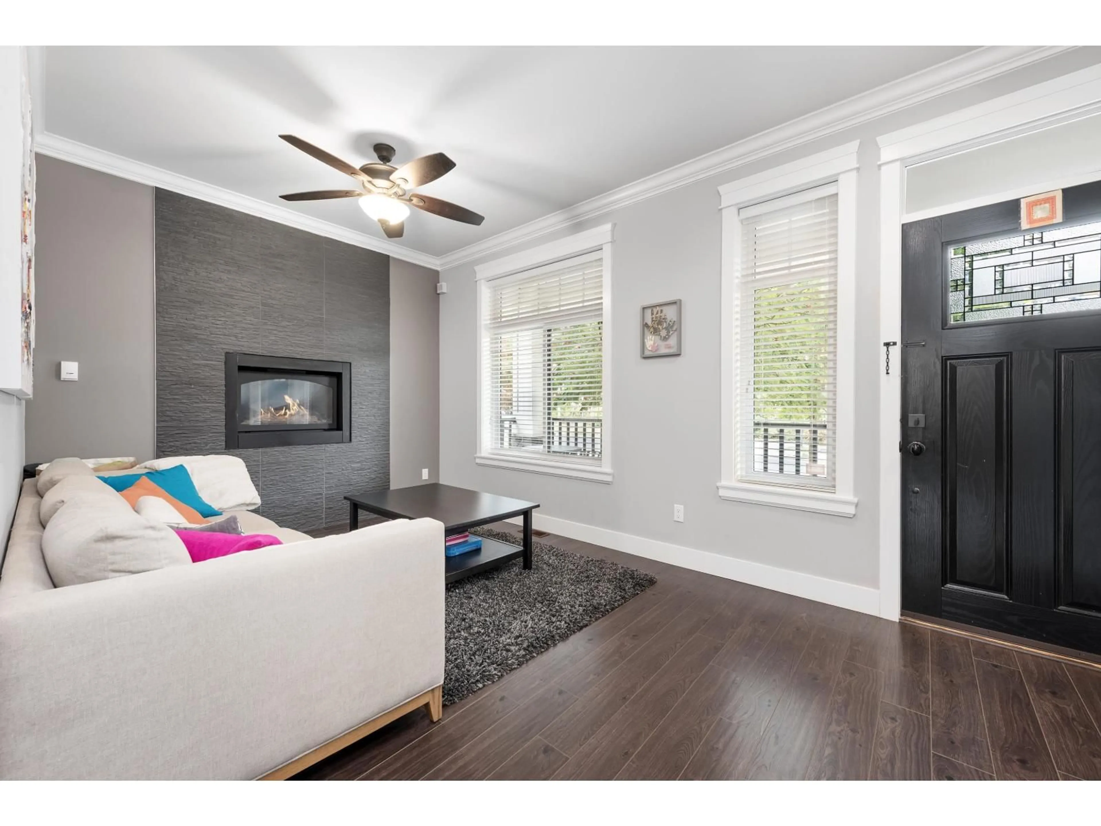 Living room with furniture, wood/laminate floor for 5911 131A, Surrey British Columbia V3X0E4