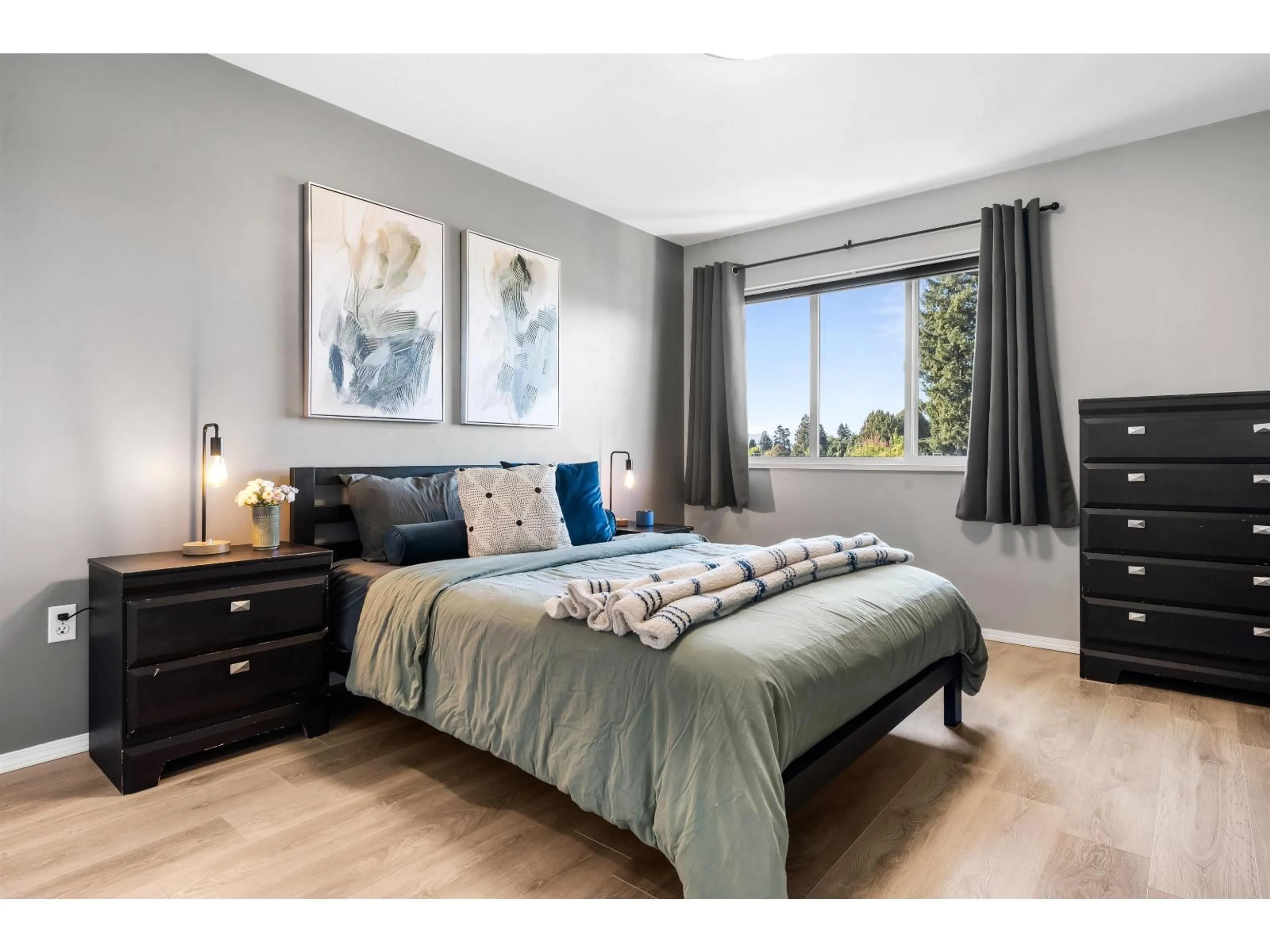 Bedroom with bed, wood/laminate floor for 403 - 46777 YALE ROAD, Chilliwack British Columbia V2P2S3