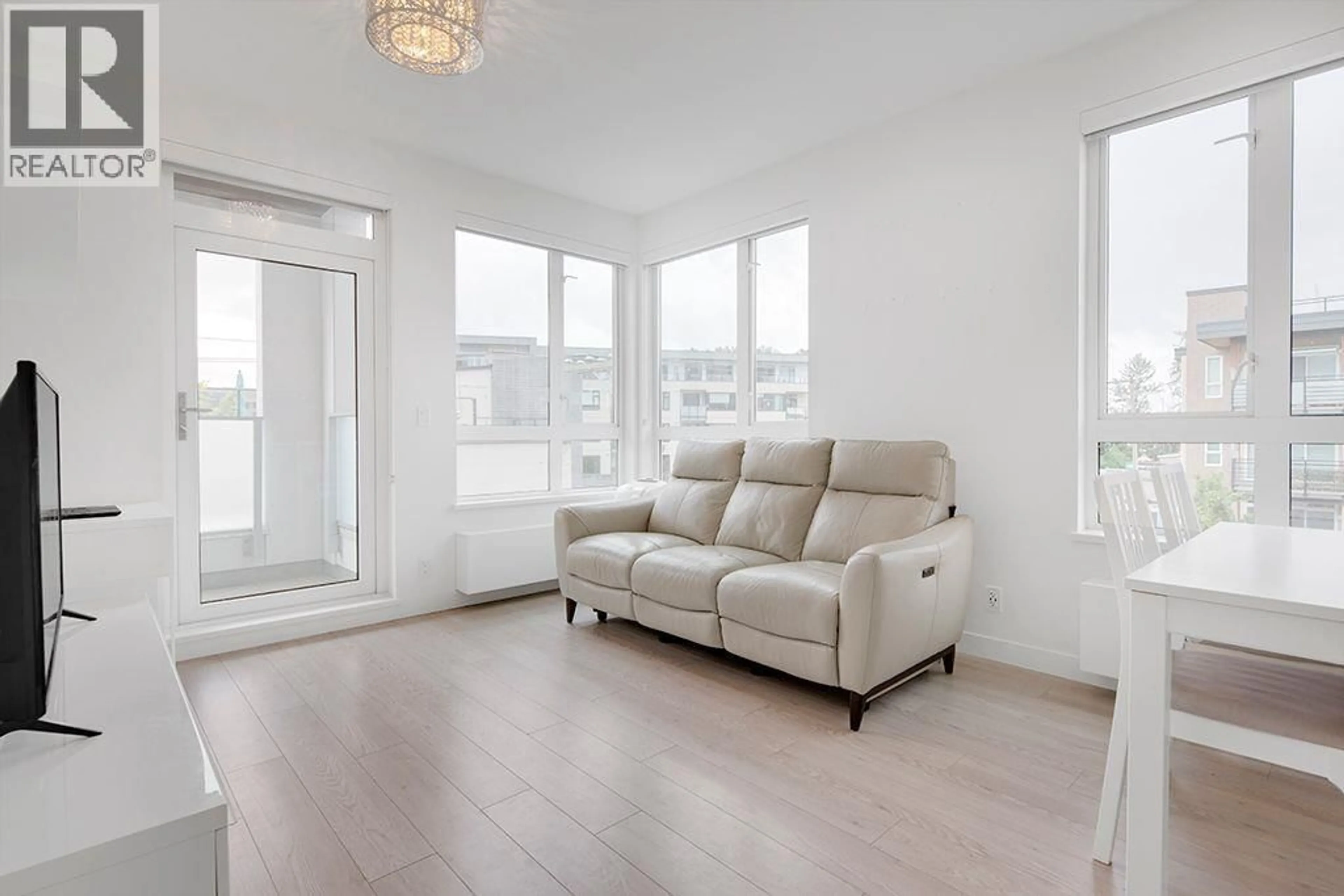 Living room with furniture, unknown for 308 - 711 14TH STREET, North Vancouver British Columbia V7M3E8