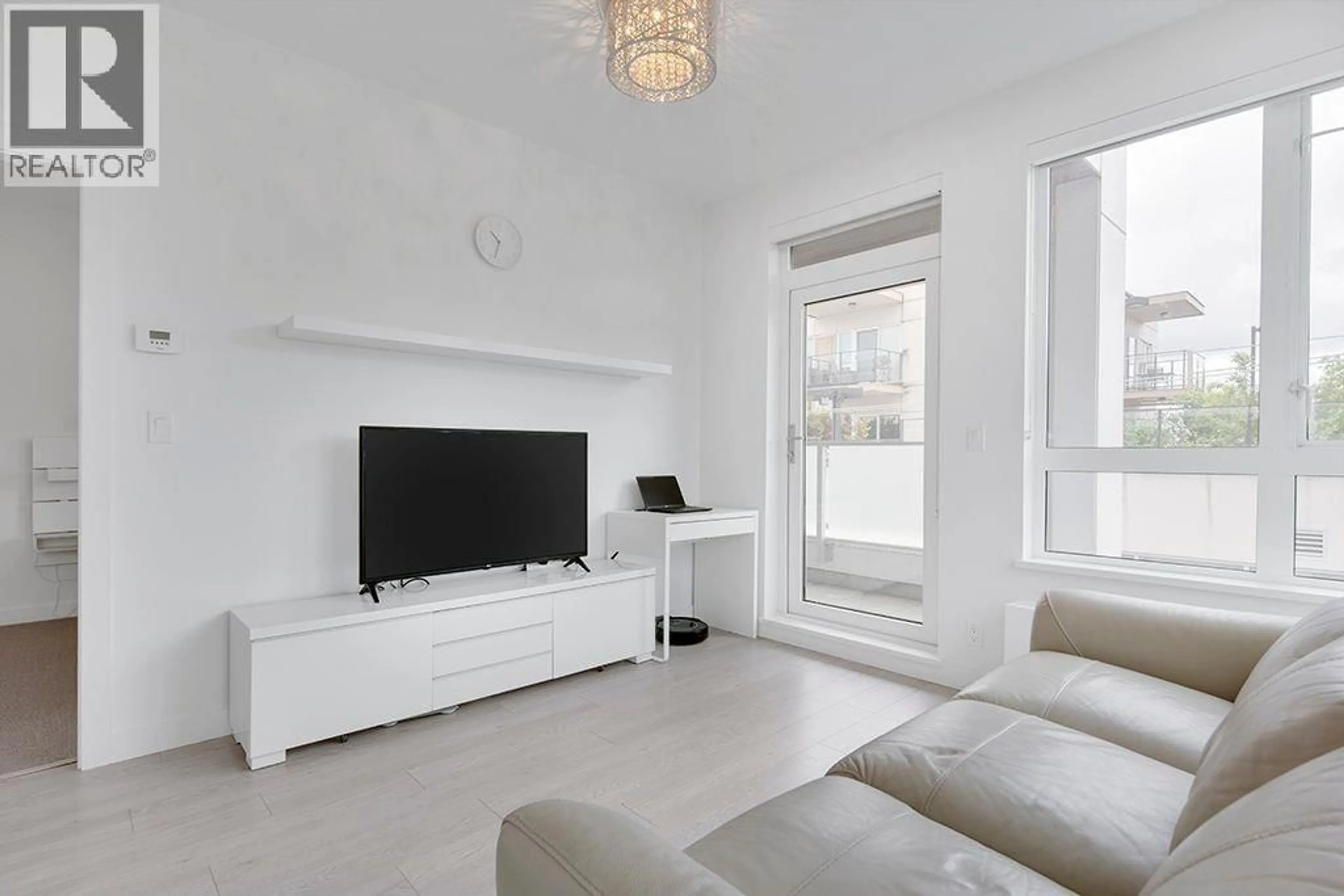 Living room with furniture, unknown for 308 - 711 14TH STREET, North Vancouver British Columbia V7M3E8