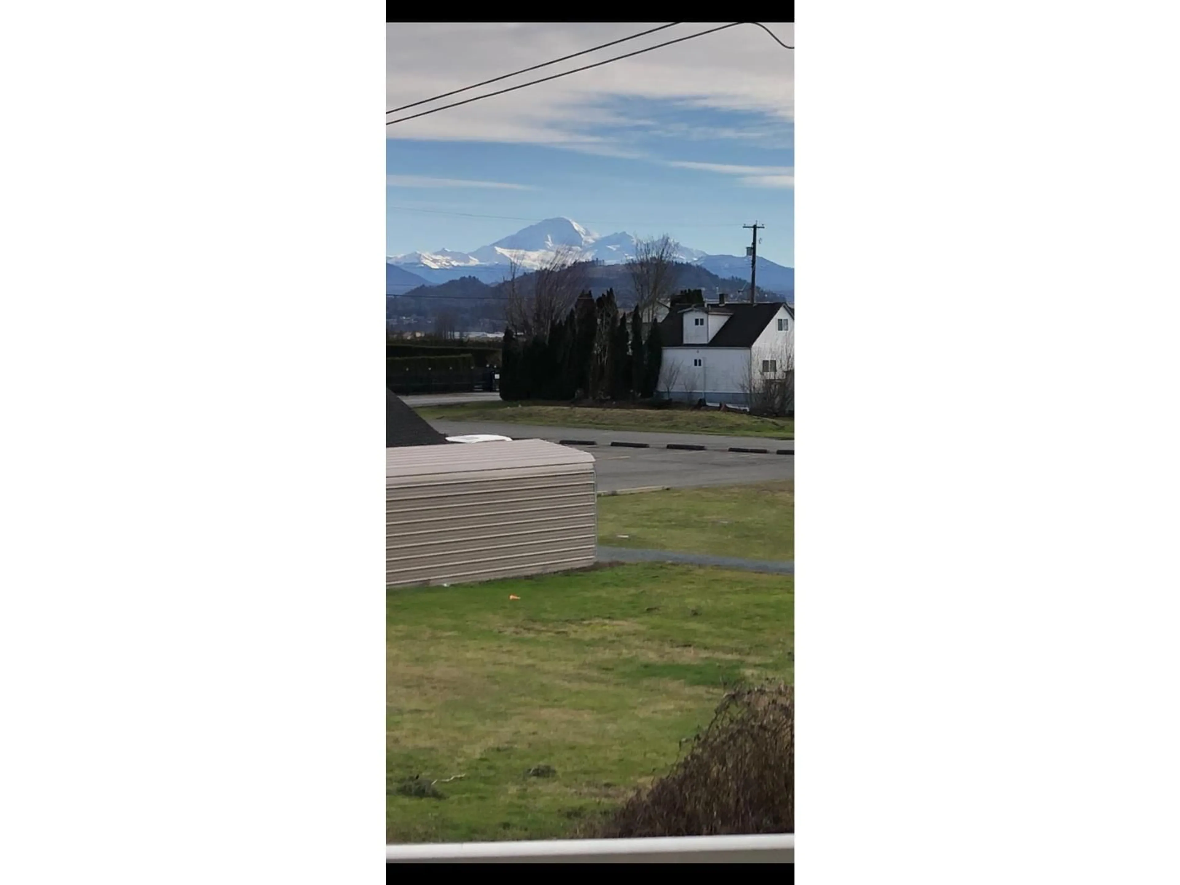 A pic from outside/outdoor area/front of a property/back of a property/a pic from drone, mountain view for 32702 HARRIS, Abbotsford British Columbia V4X1W1