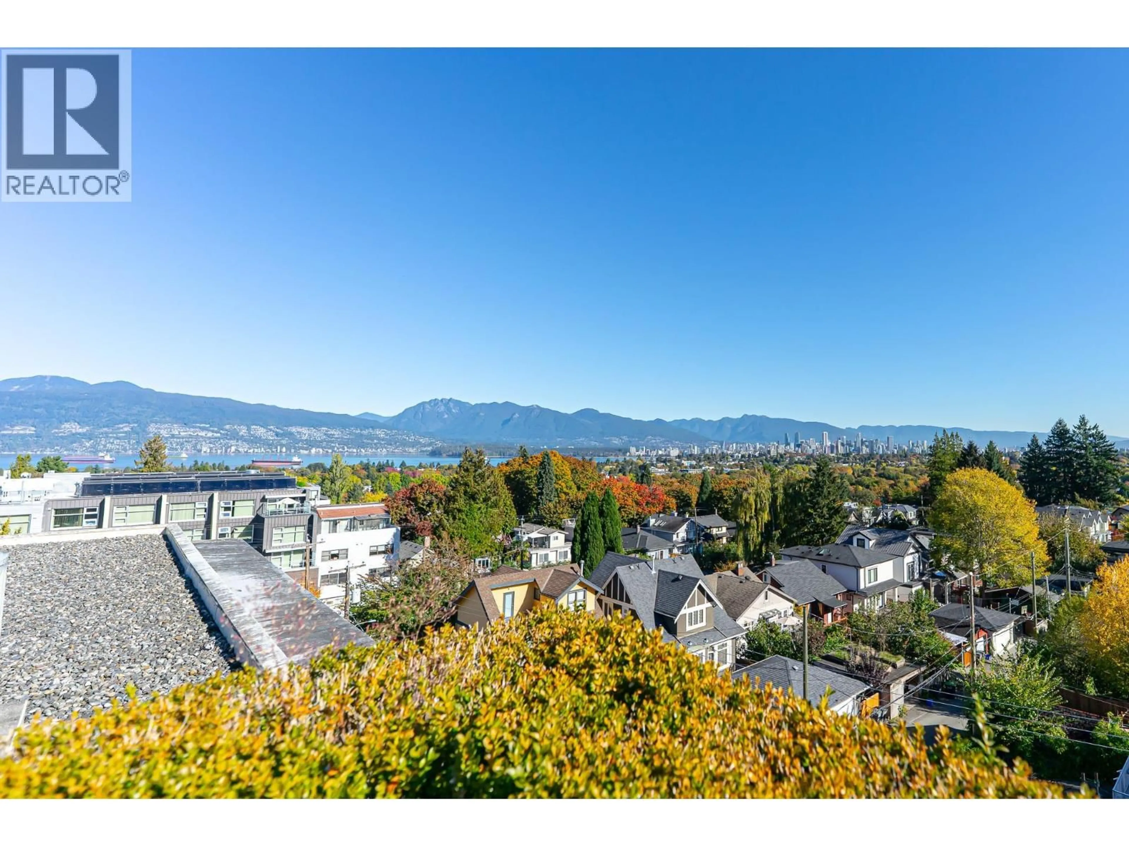A pic from outside/outdoor area/front of a property/back of a property/a pic from drone, mountain view for 104 - 3595 18TH AVENUE, Vancouver British Columbia V6S1A9