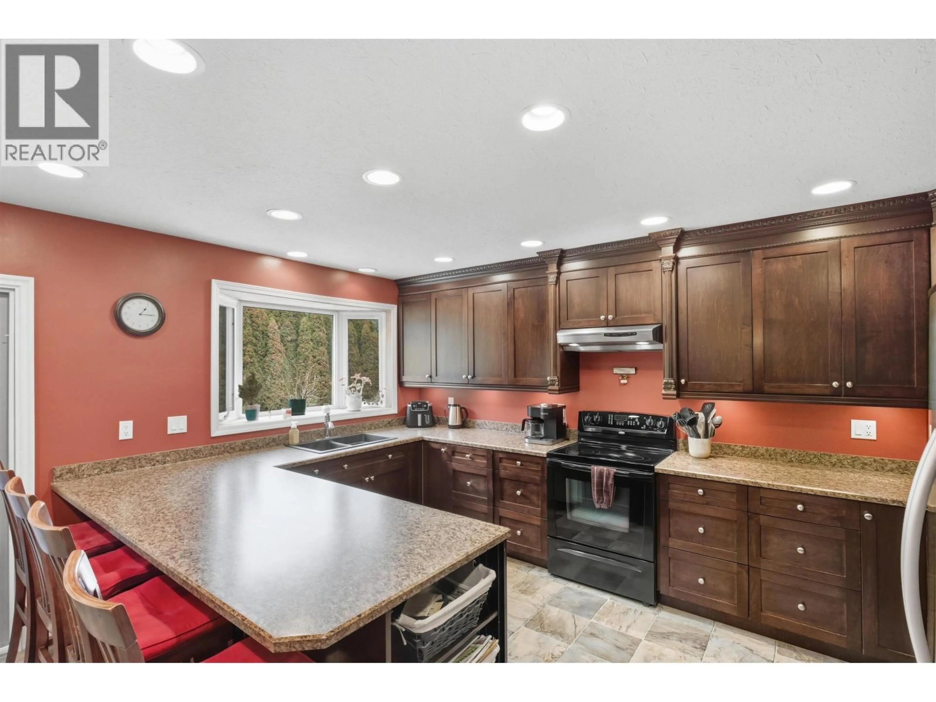 Open concept kitchen, ceramic/tile floor for 1425 ESLER ROAD, Esler / Dog Creek British Columbia V2G4Y2