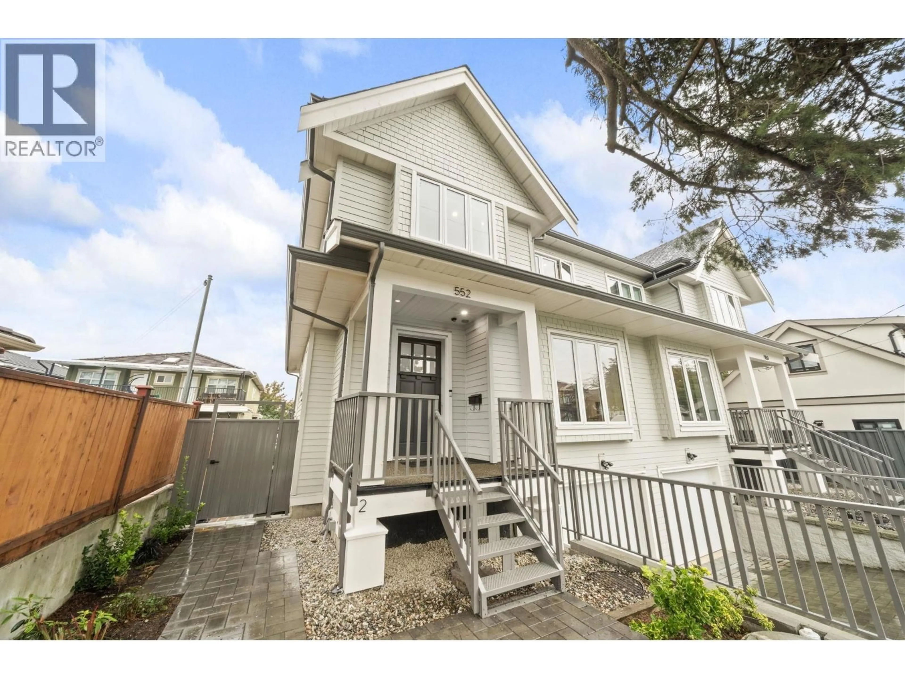 Home with vinyl exterior material, street for 552 58TH AVENUE, Vancouver British Columbia V5X1W2