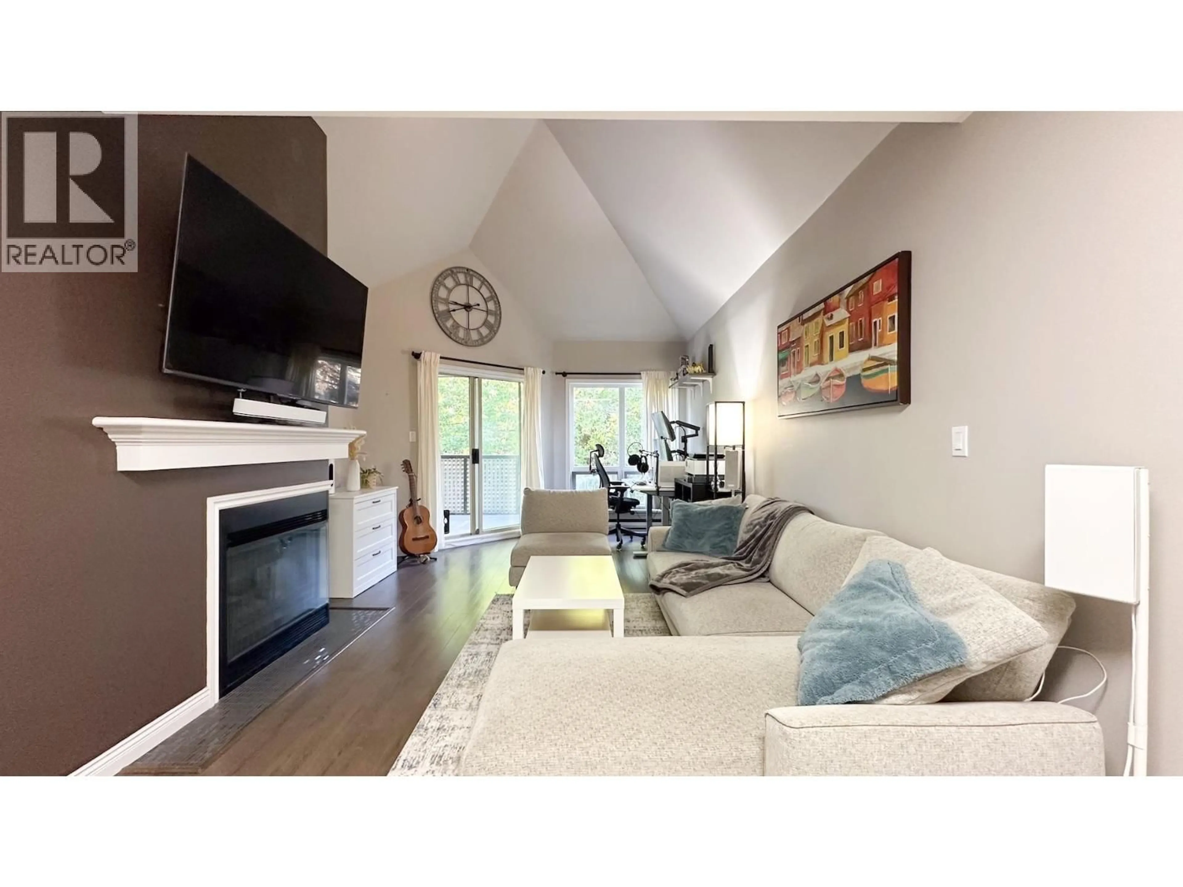 Living room with furniture, wood/laminate floor for 305 - 7457 MOFFATT ROAD, Richmond British Columbia V6Y1X9