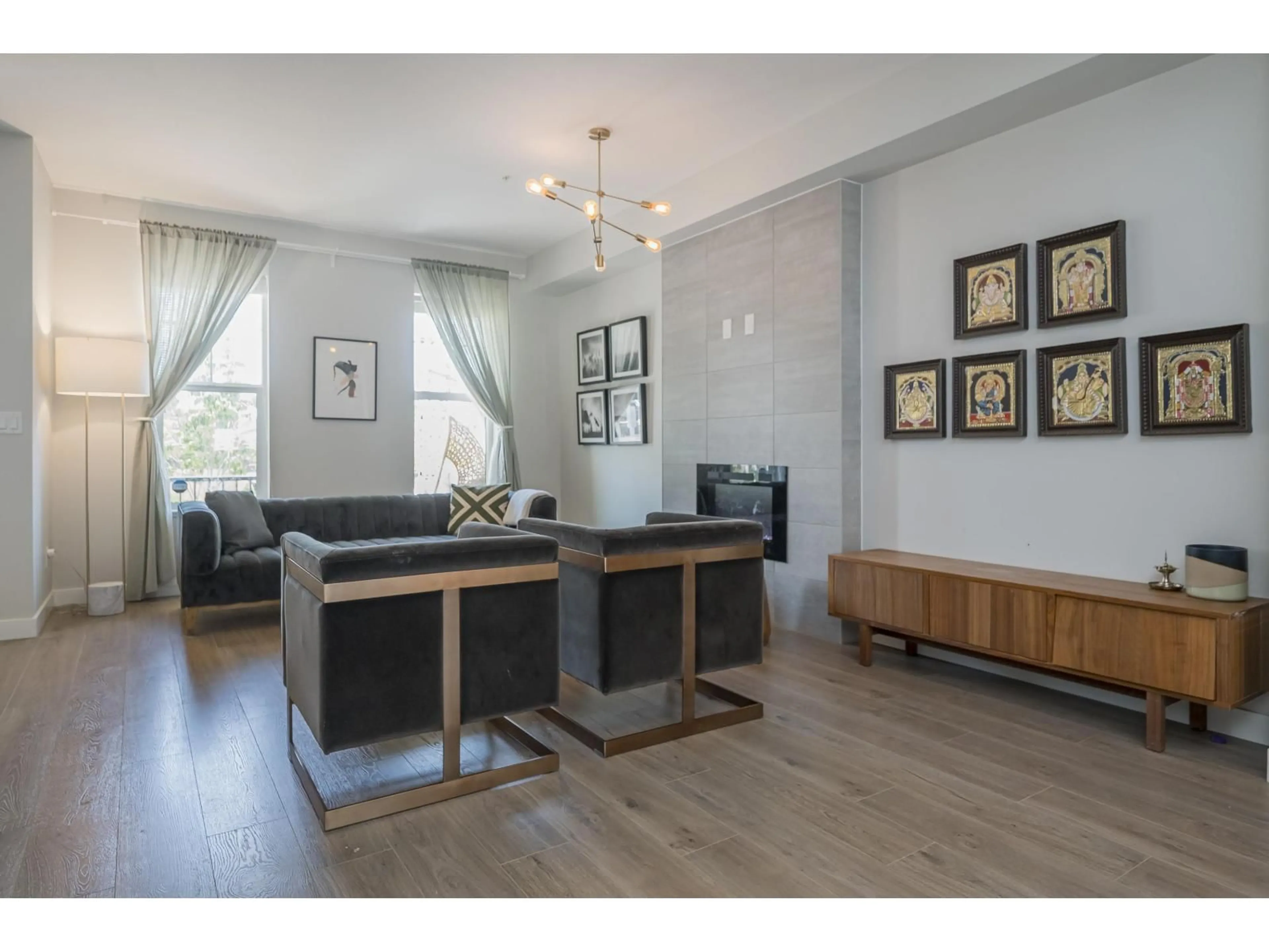 Living room with furniture, wood/laminate floor for 20247 82B, Langley British Columbia V2Y0Y9