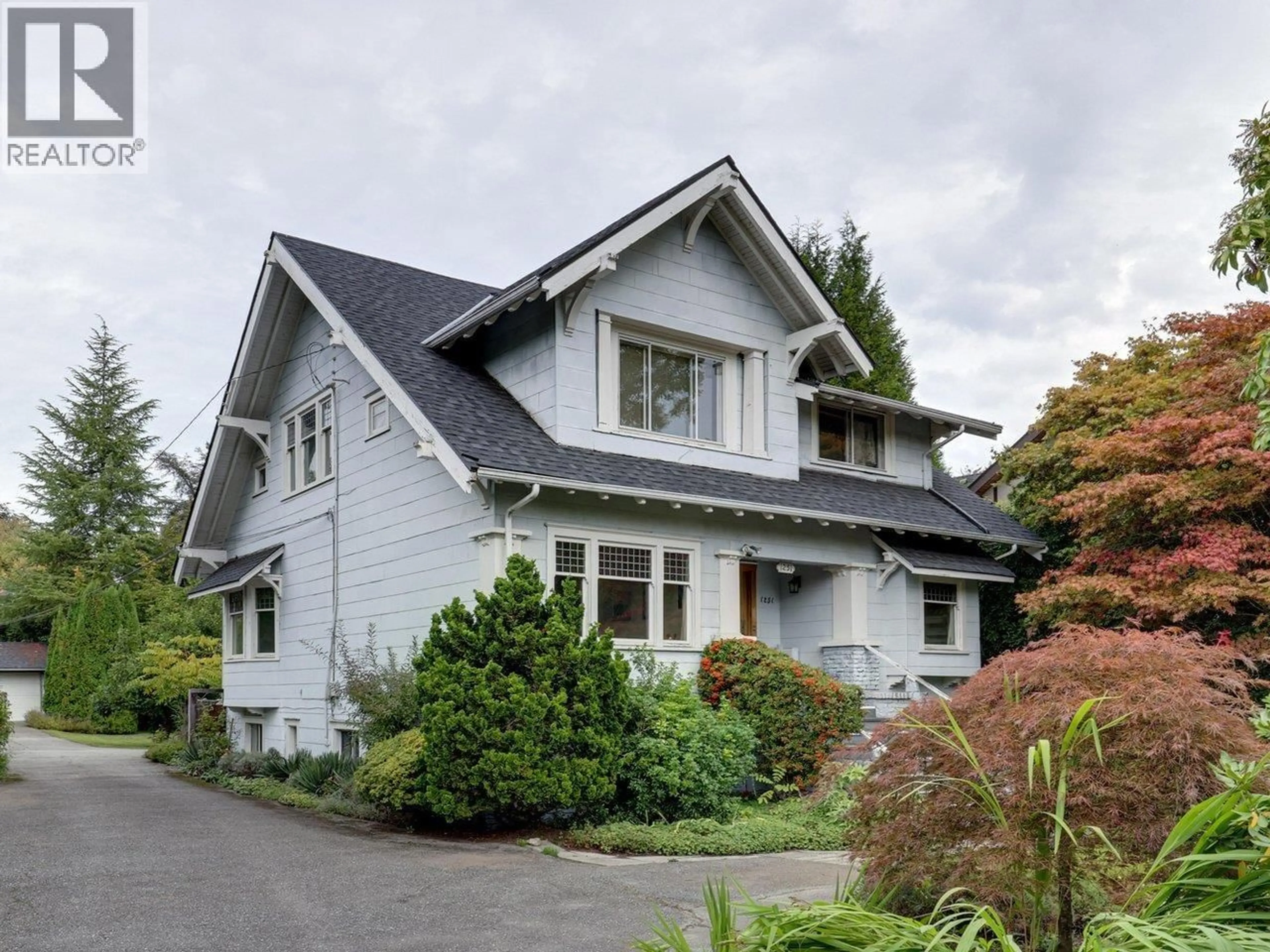 Home with vinyl exterior material, street for 1251 KING EDWARD AVENUE, Vancouver British Columbia V6H1Z8