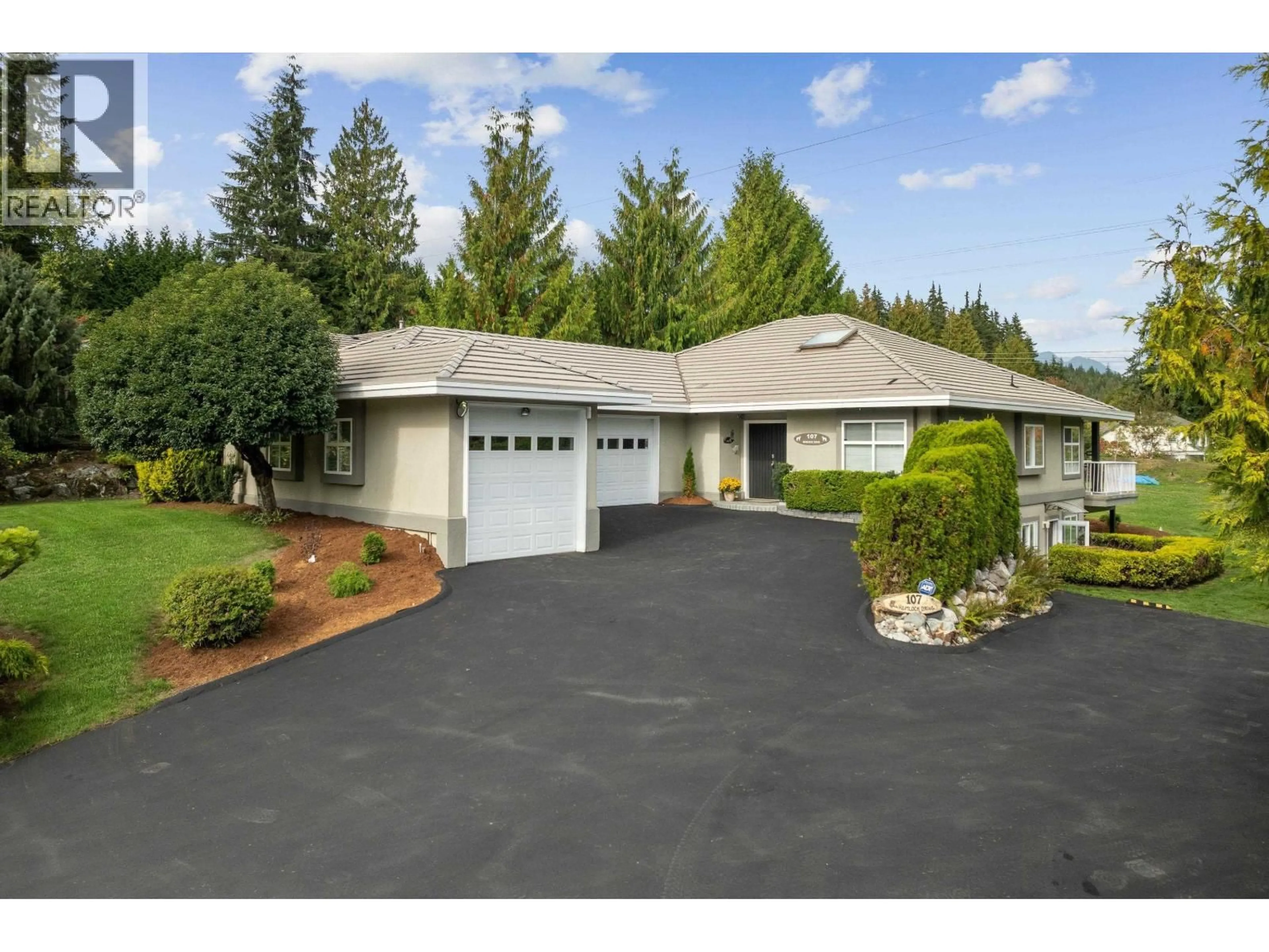 Home with vinyl exterior material, street for 107 HEMLOCK DRIVE, Anmore British Columbia V3H4W9