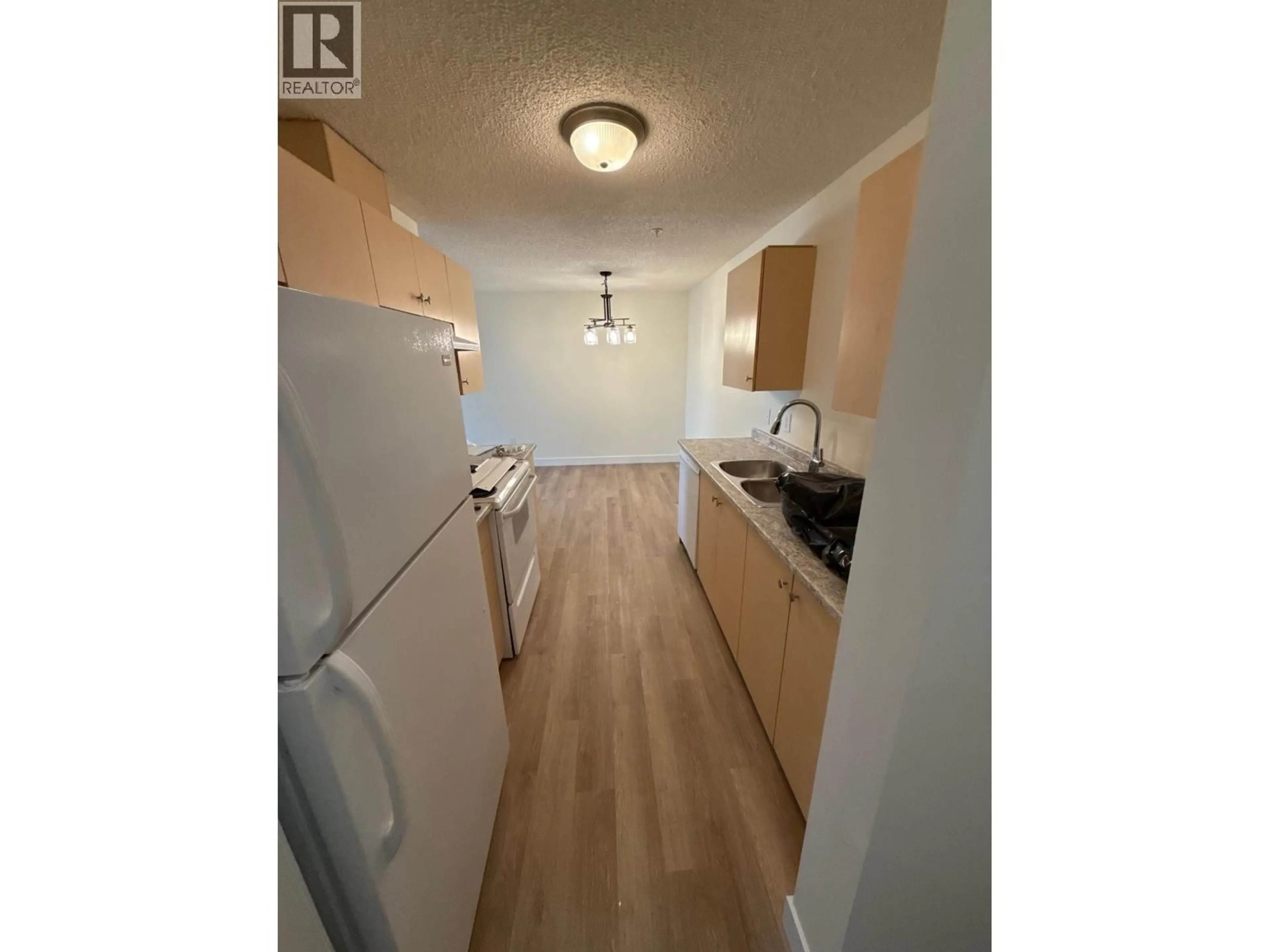 Standard kitchen, wood/laminate floor for 109 - 8507 86 STREET, Fort St. John British Columbia V1J0E4