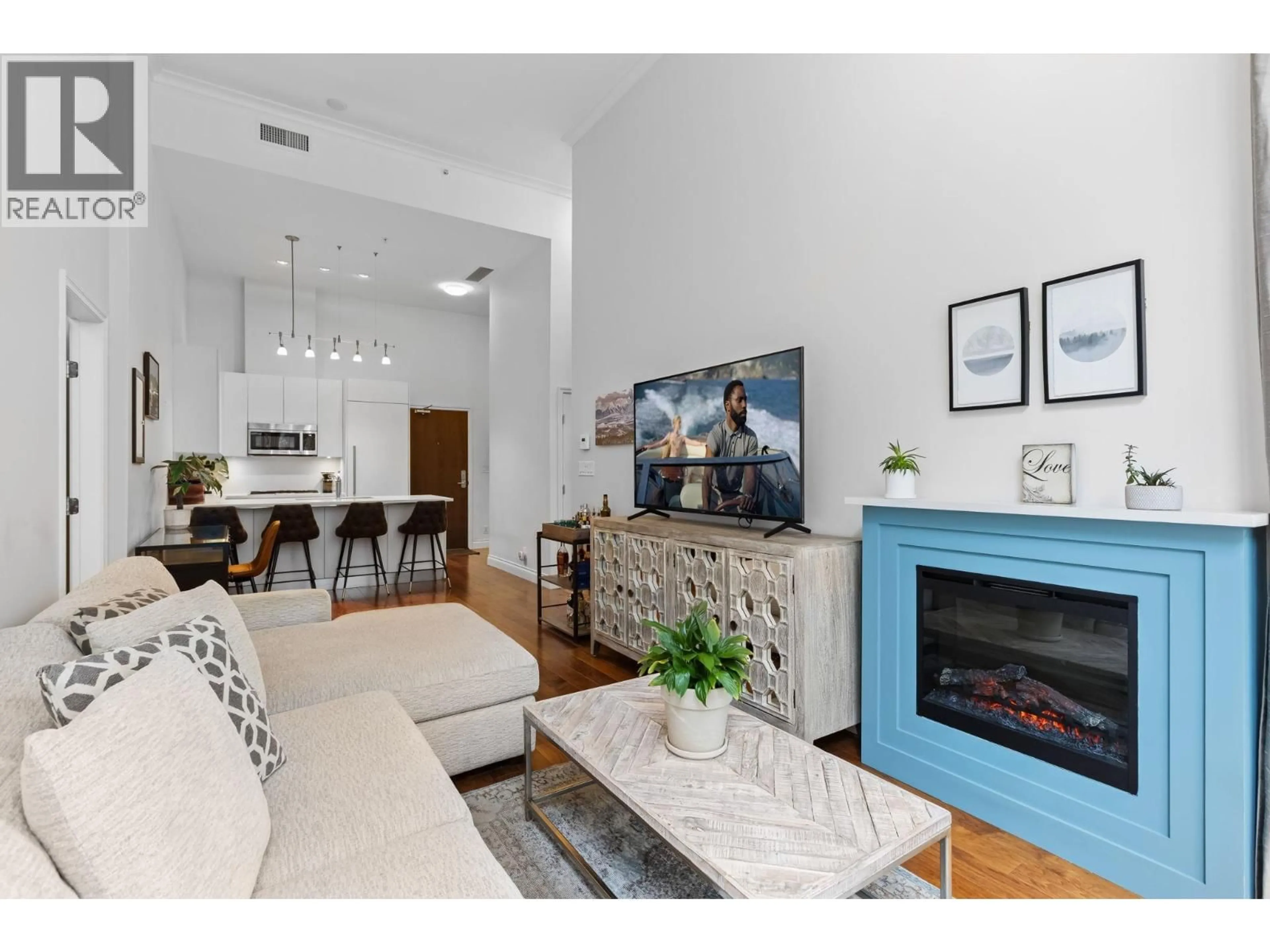 Living room with furniture, unknown for 104 - 199 VICTORY SHIP WAY, North Vancouver British Columbia V9L0E2