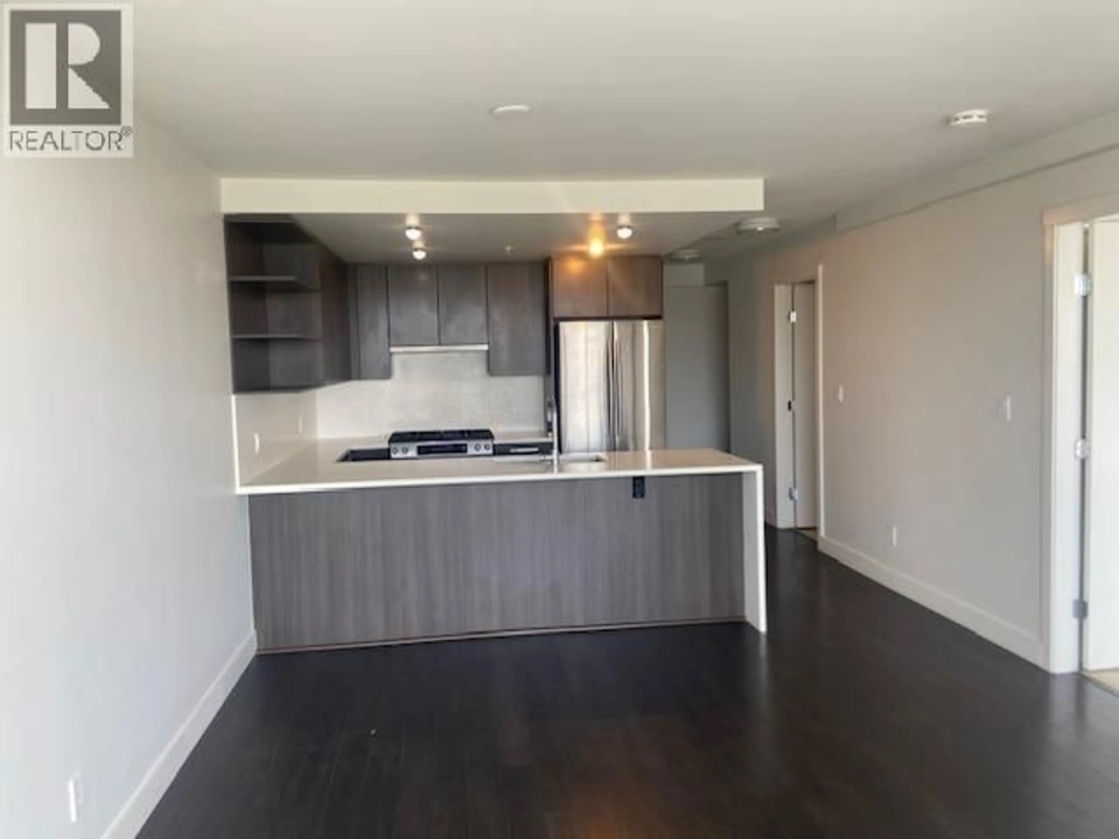 Open concept kitchen, wood/laminate floor for 1706 - 8288 GRANVILLE AVENUE, Richmond British Columbia V6Y0H6