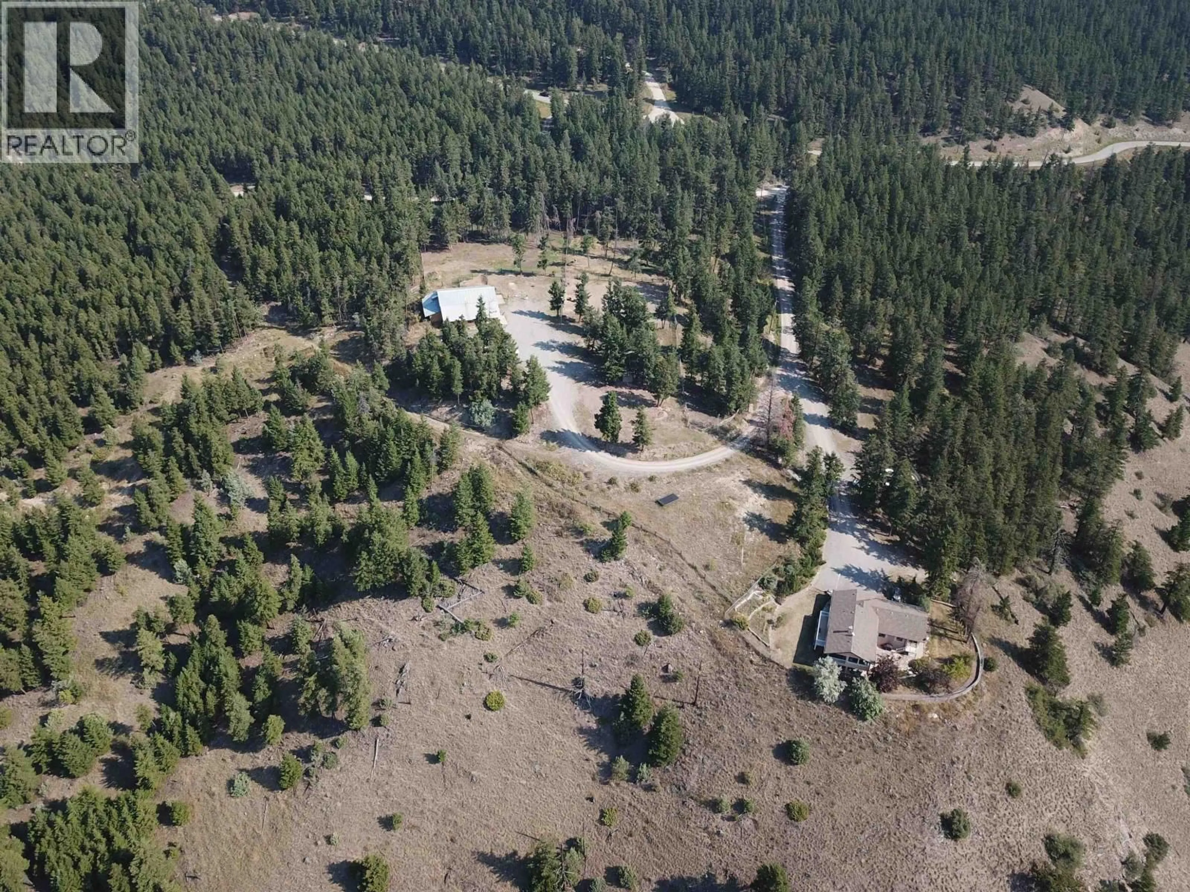 A pic from outside/outdoor area/front of a property/back of a property/a pic from drone, forest/trees view for 1121 SODA CREEK ROAD, Williams Lake British Columbia V2G5E4