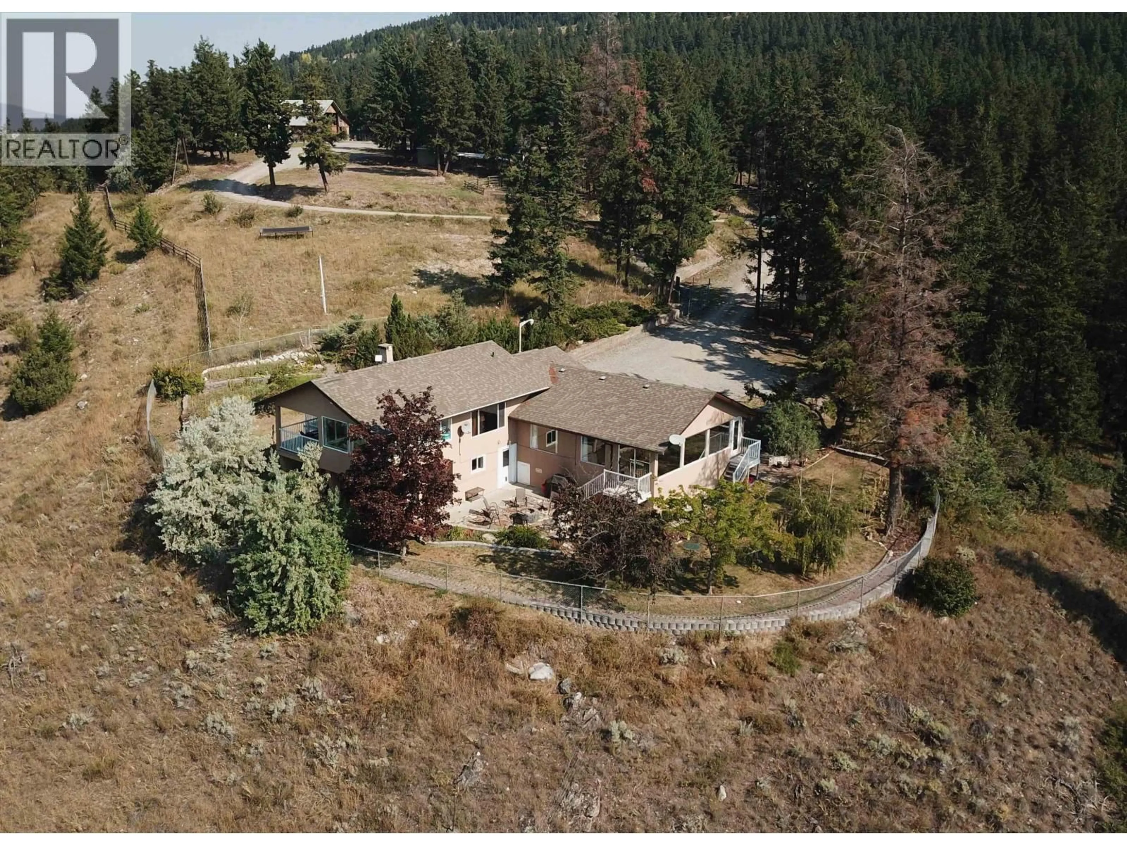 A pic from outside/outdoor area/front of a property/back of a property/a pic from drone, mountain view for 1121 SODA CREEK ROAD, Williams Lake British Columbia V2G5E4