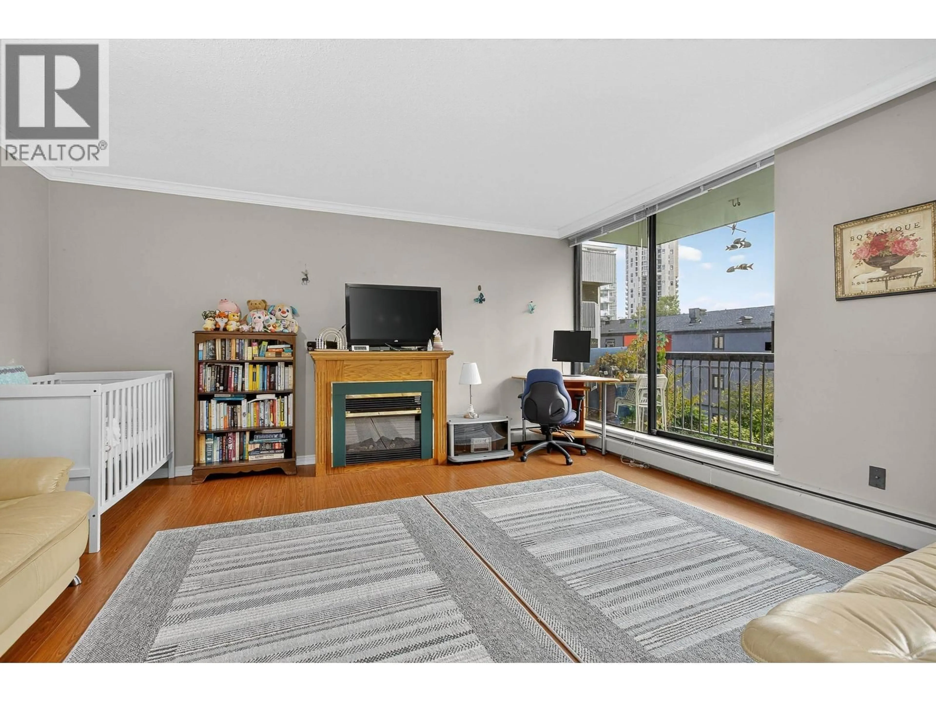 Living room with furniture, unknown for 102 - 1146 HARWOOD STREET, Vancouver British Columbia V6E3V1