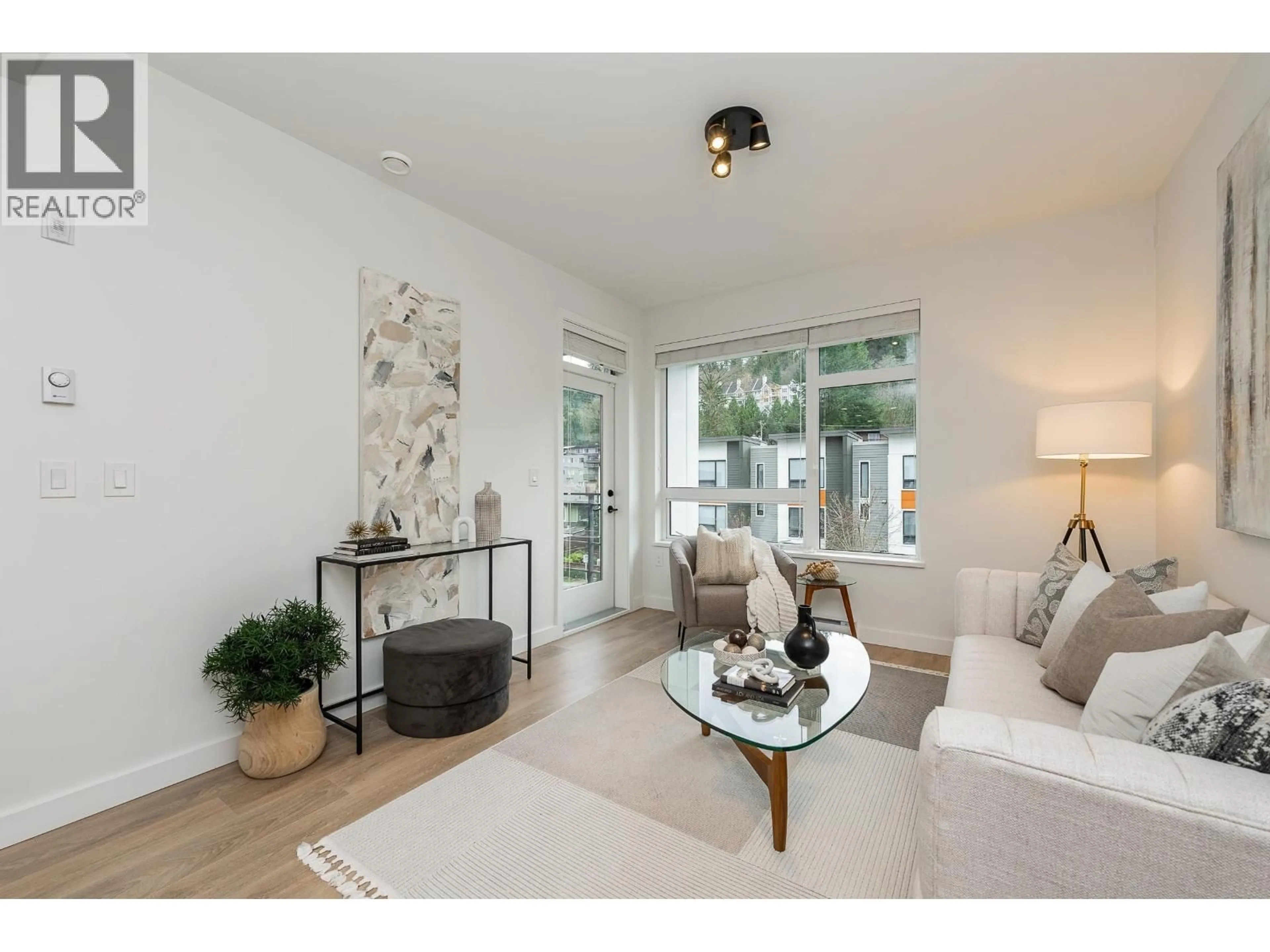 Living room with furniture, unknown for 112 - 3038 ST GEORGE STREET, Port Moody British Columbia V3H0L3