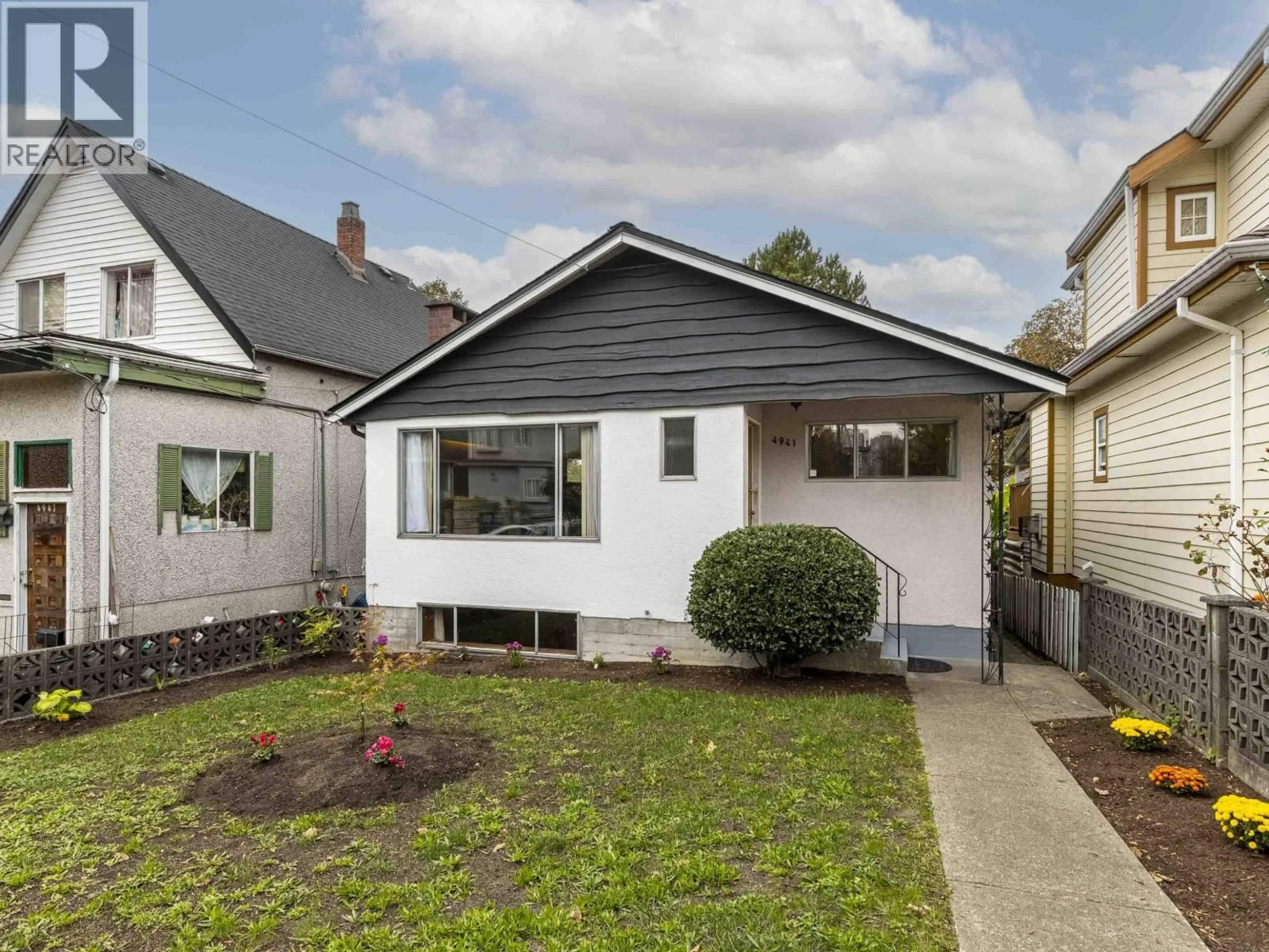 Home with vinyl exterior material, street for 4941 SPENCER STREET, Vancouver British Columbia V5R3Z9
