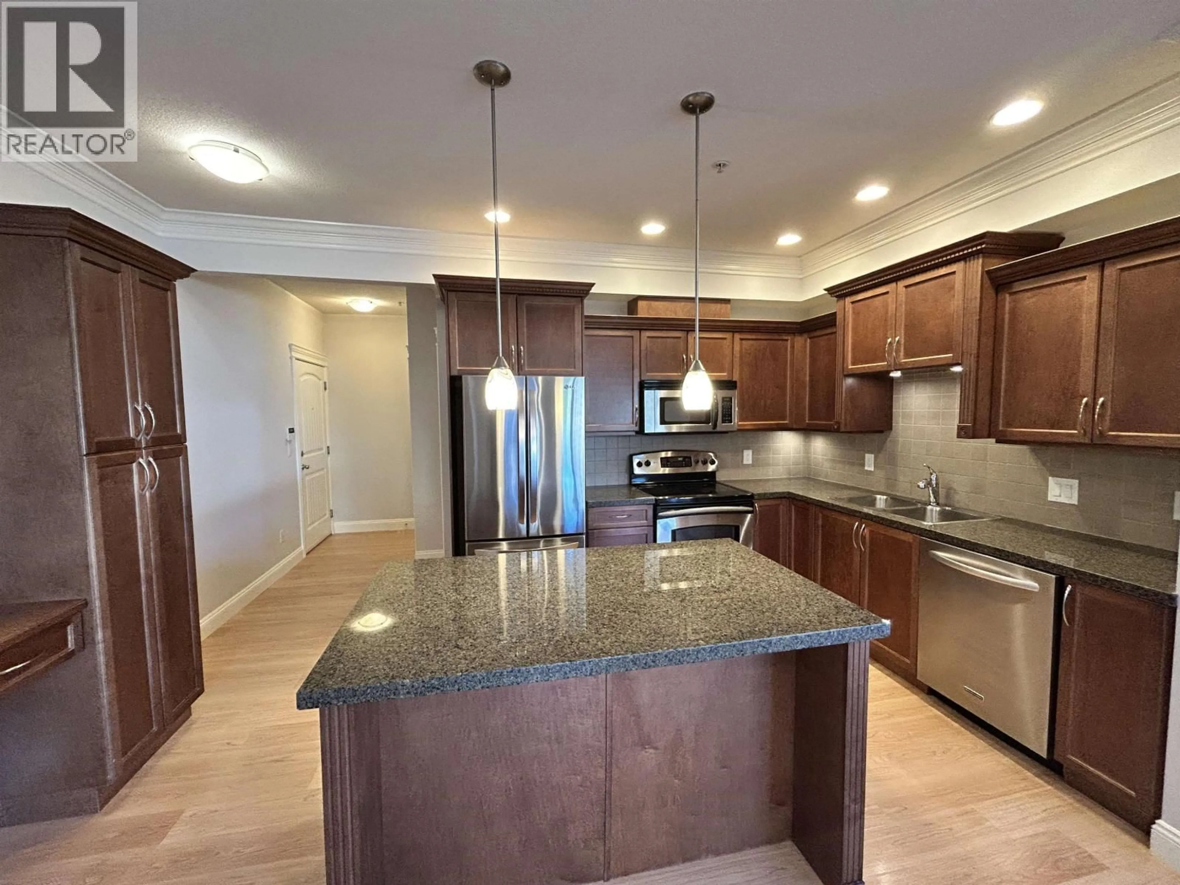 Open concept kitchen, ceramic/tile floor for 215 - 22150 DEWDNEY TRUNK ROAD, Maple Ridge British Columbia V2X3H6