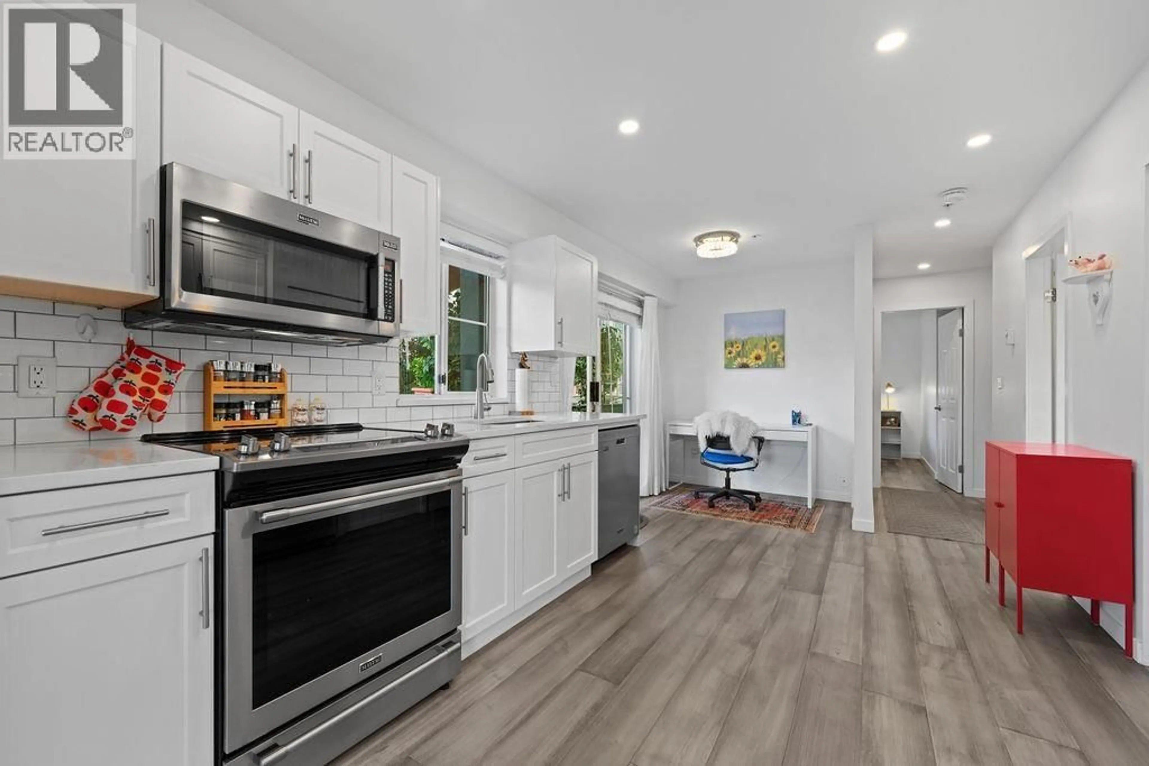 Open concept kitchen, ceramic/tile floor for 111 - 6 RENAISSANCE SQUARE, New Westminster British Columbia V3M6N8