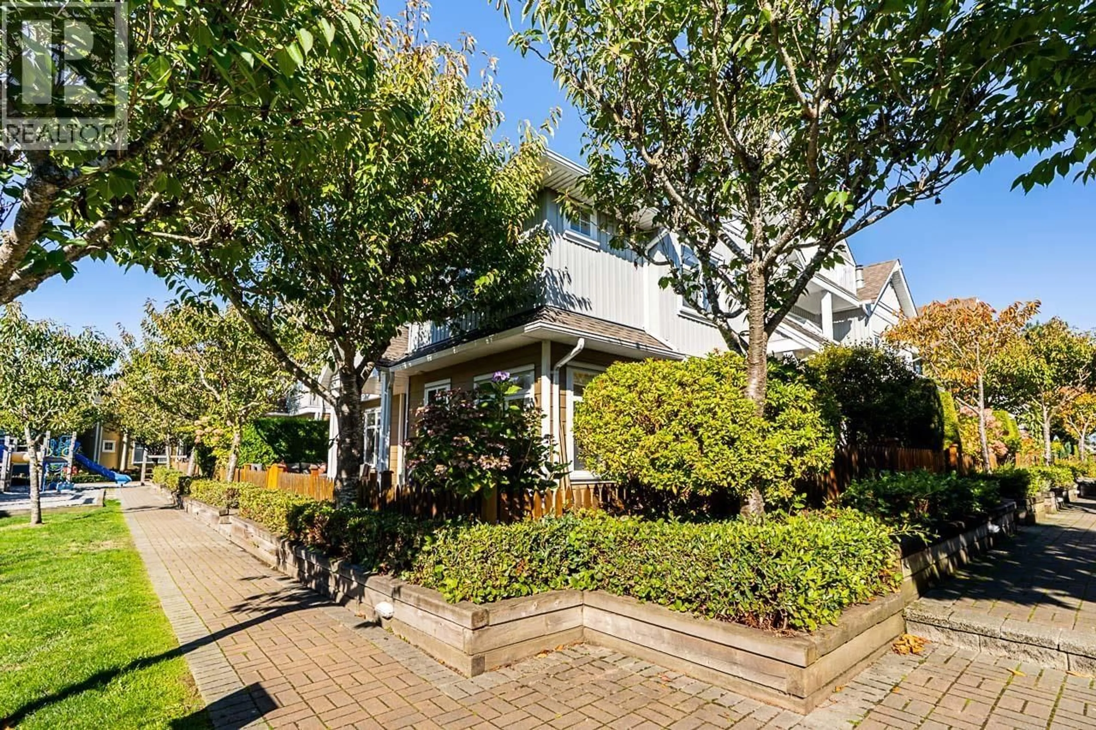 A pic from outside/outdoor area/front of a property/back of a property/a pic from drone, street for 26 - 6300 LONDON ROAD, Richmond British Columbia V7E6V6