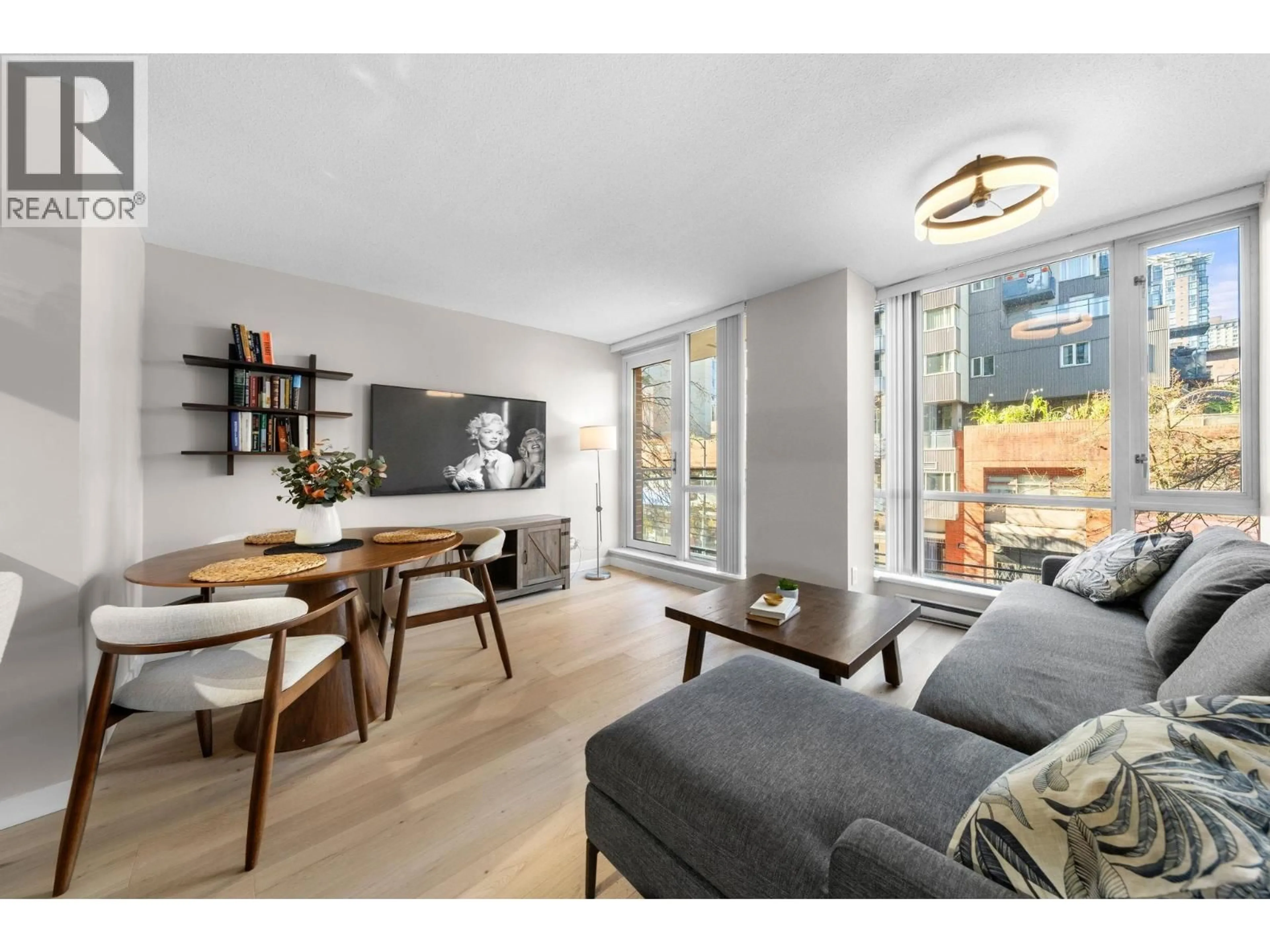 Living room with furniture, wood/laminate floor for 305 - 1082 SEYMOUR STREET, Vancouver British Columbia V6B1X9