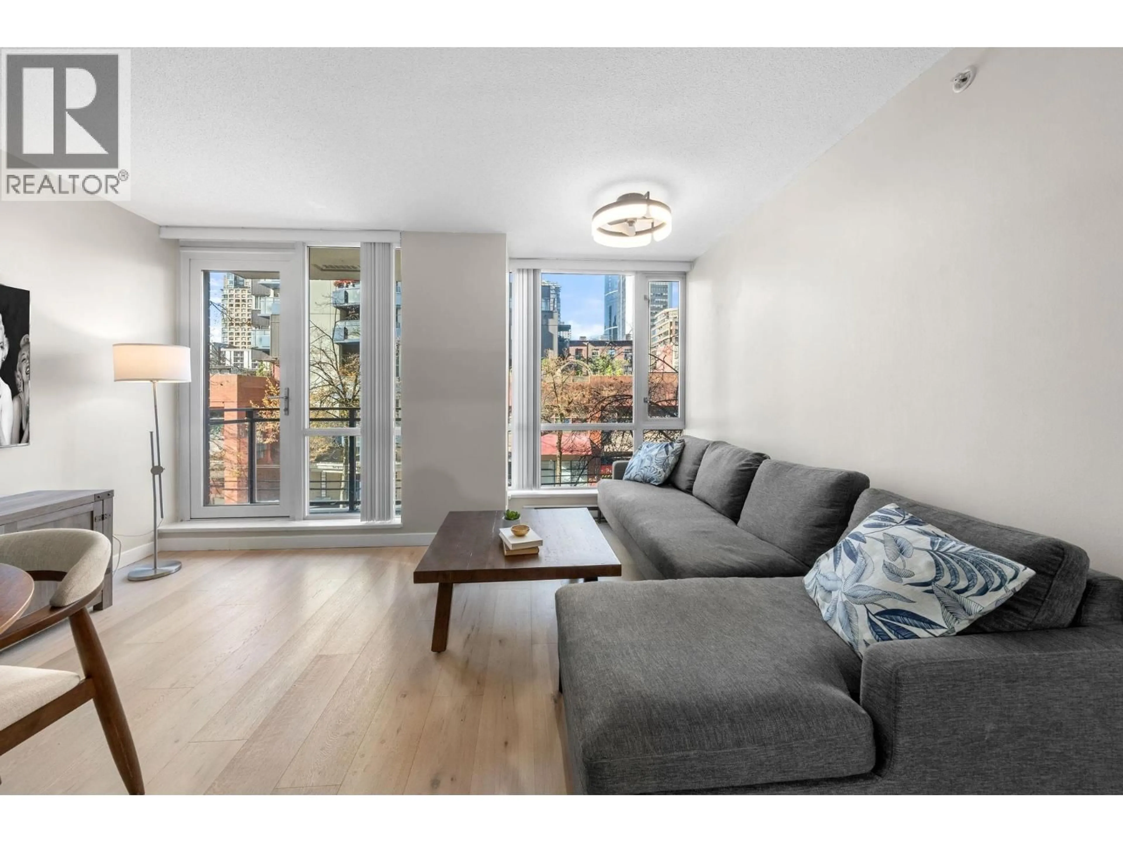 Living room with furniture, wood/laminate floor for 305 - 1082 SEYMOUR STREET, Vancouver British Columbia V6B1X9