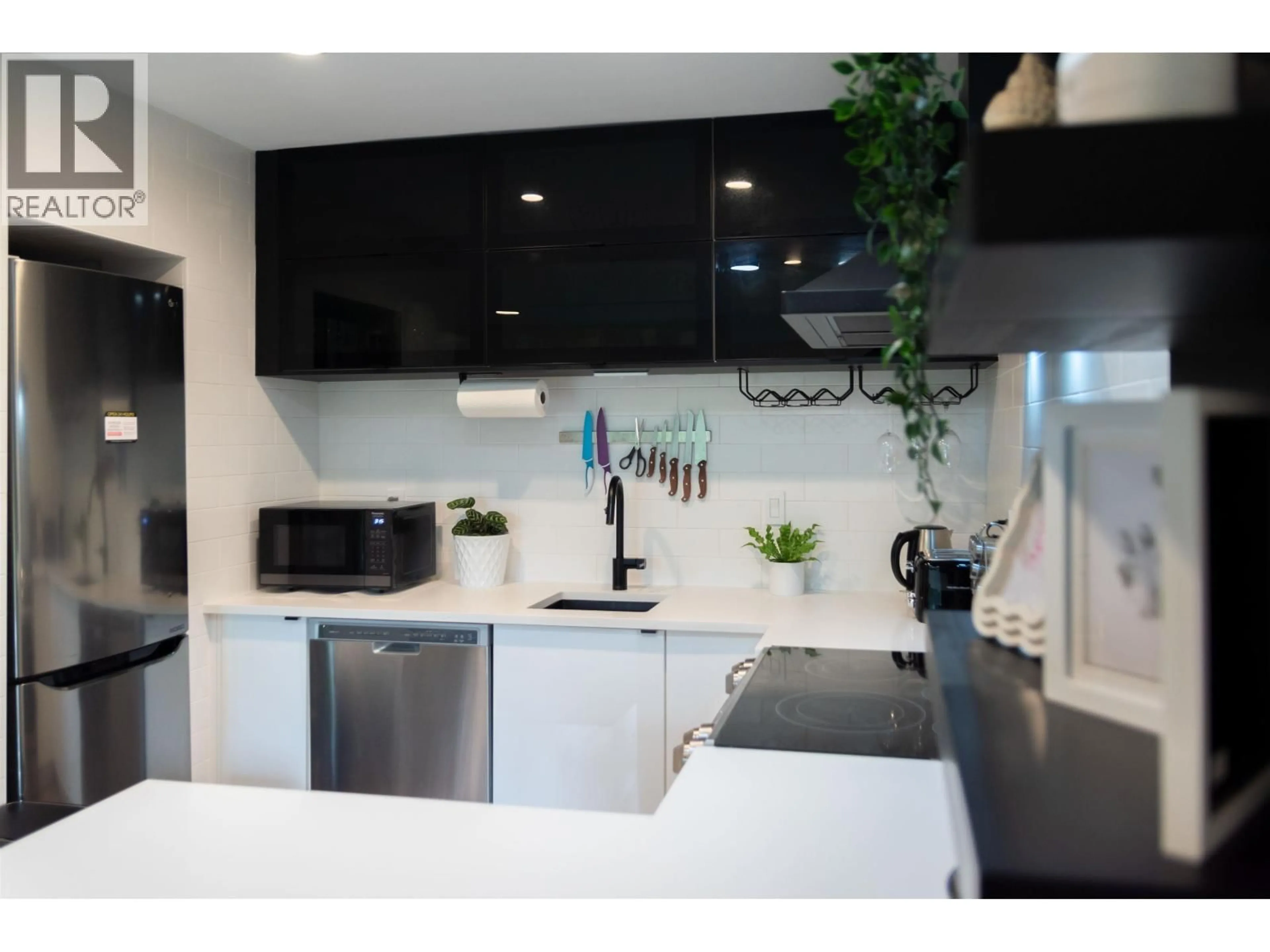 Contemporary kitchen, ceramic/tile floor for 402 - 1718 NELSON STREET, Vancouver British Columbia V6G1M8