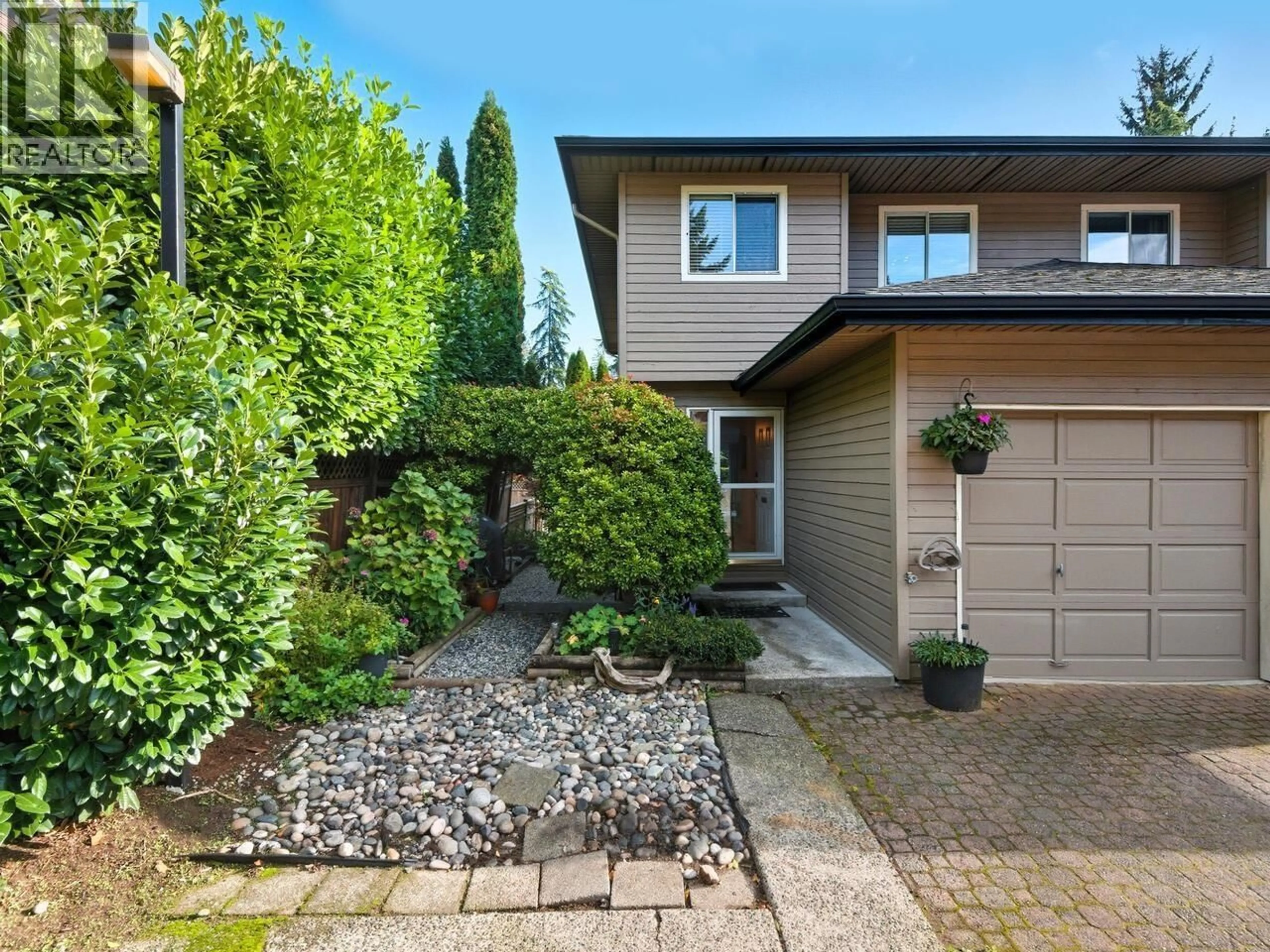 Home with brick exterior material, street for 3920 INDIAN RIVER DRIVE, North Vancouver British Columbia V7G2G8