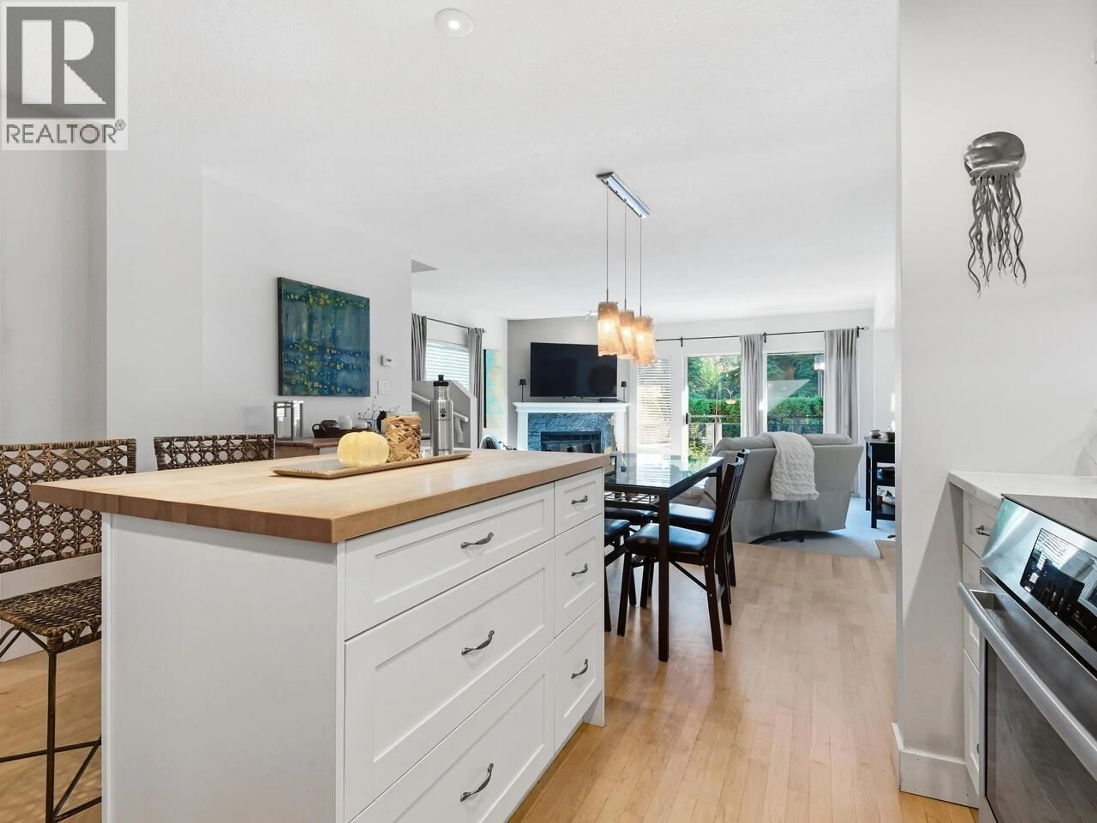 Open concept kitchen, wood/laminate floor for 3920 INDIAN RIVER DRIVE, North Vancouver British Columbia V7G2G8