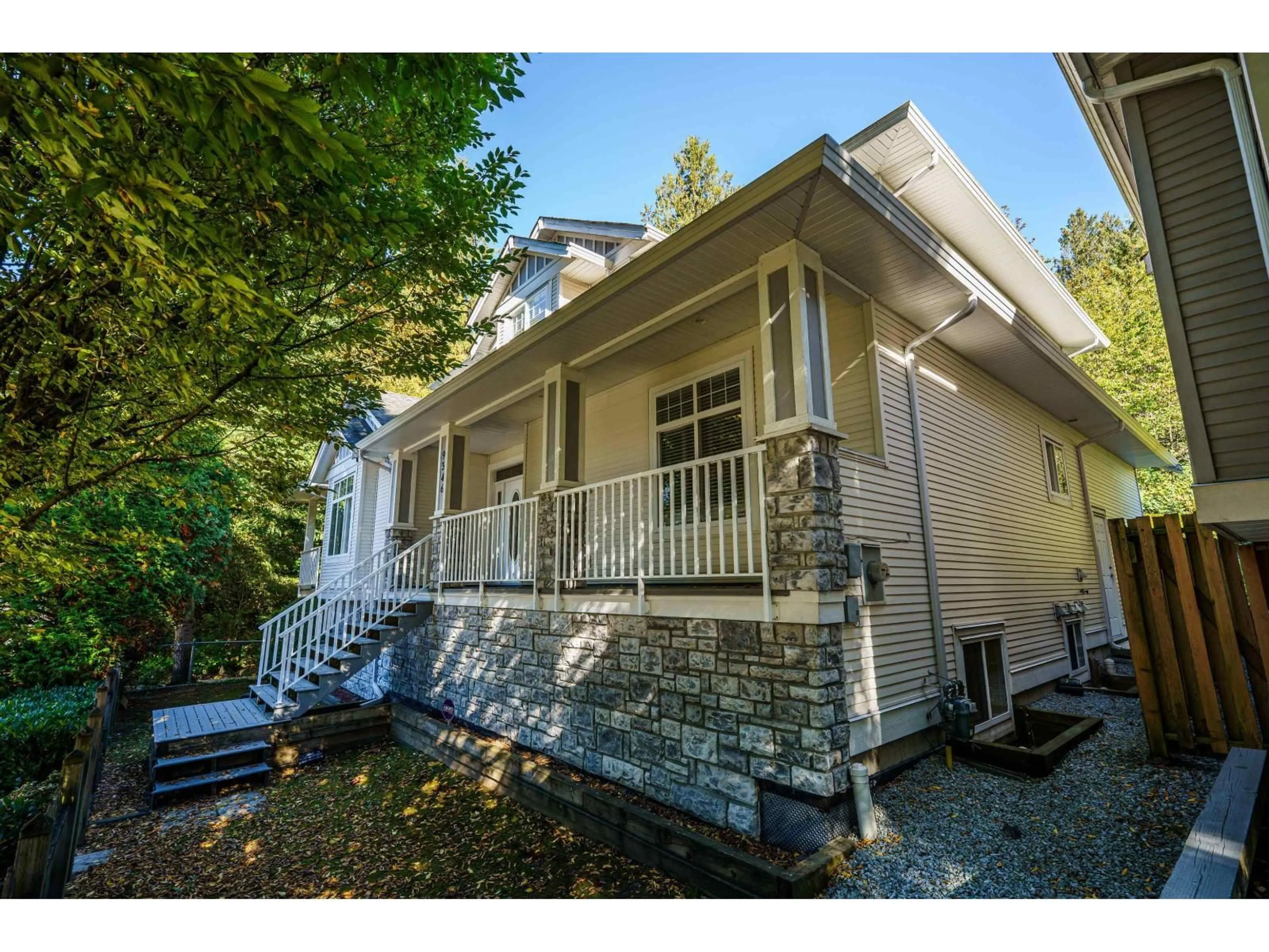 Home with vinyl exterior material, street for 9346 216, Langley British Columbia V1M4E1