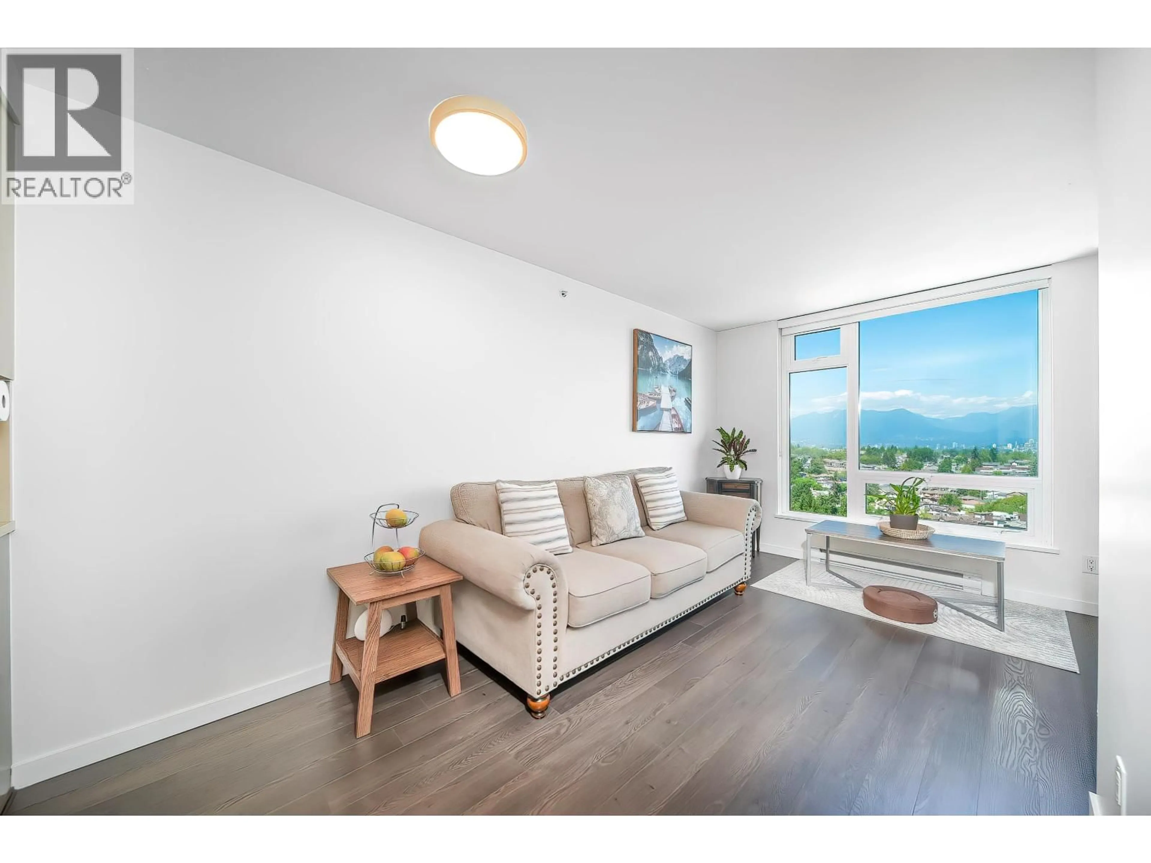 Living room with furniture, wood/laminate floor for 1703 - 5515 BOUNDARY ROAD, Vancouver British Columbia V5R0E5