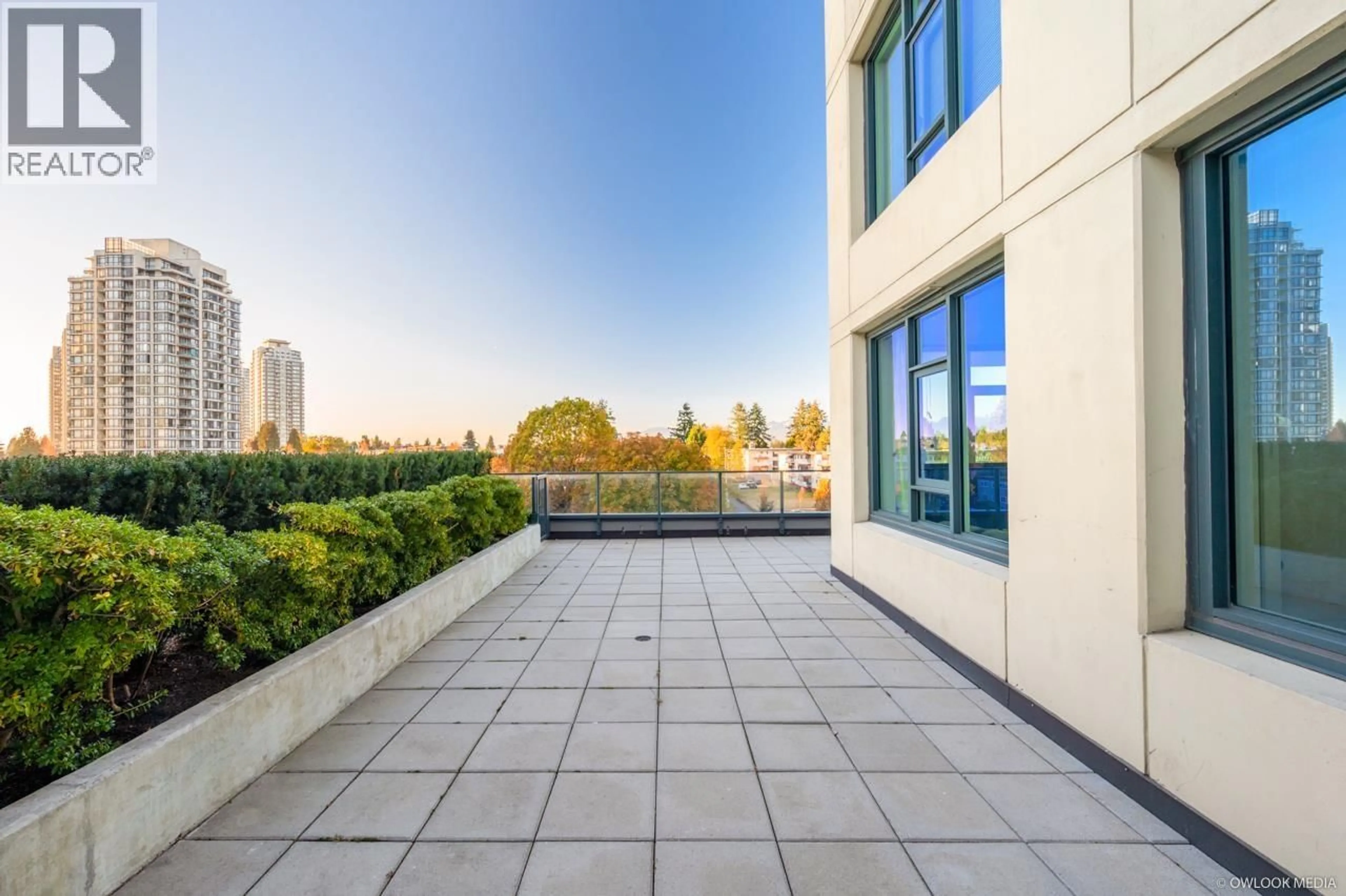 Patio, city buildings view from balcony for 402 - 7303 NOBLE LANE, Burnaby British Columbia V3N0H2