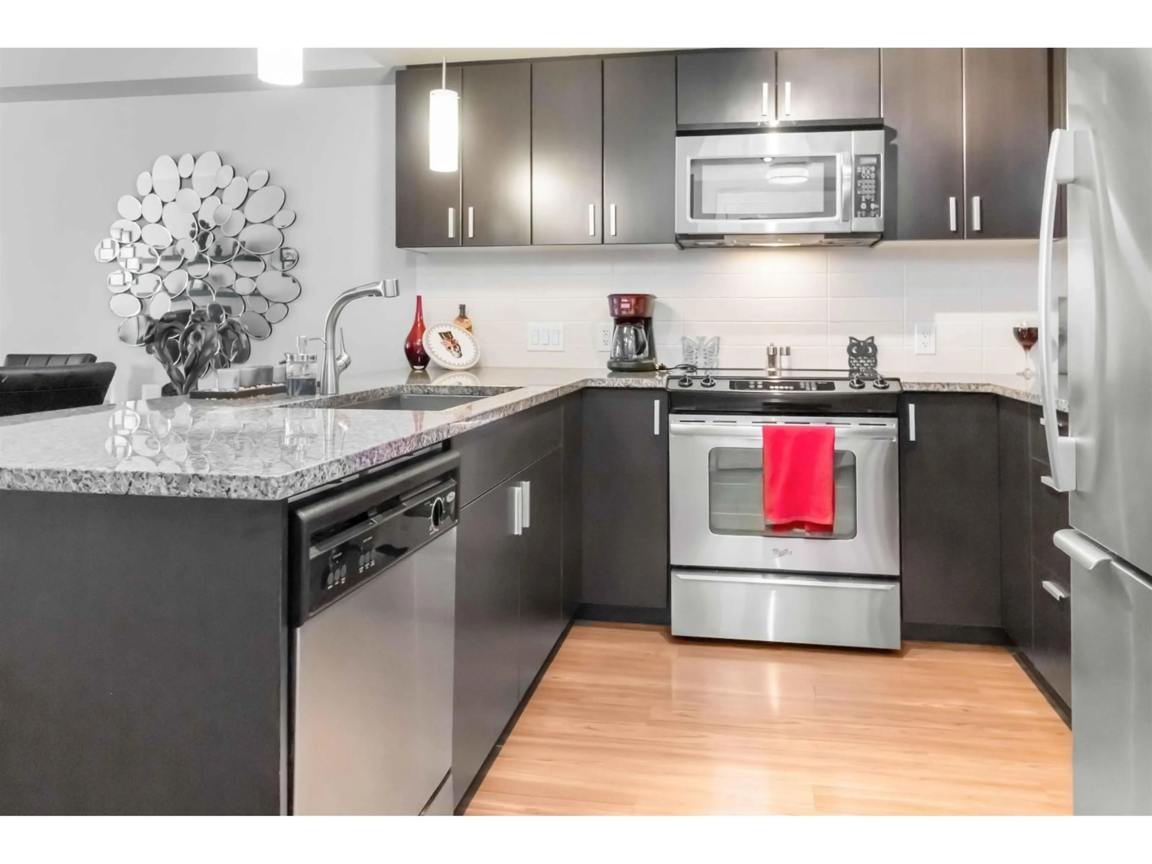 Open concept kitchen, unknown for 309 - 7511 120, Delta British Columbia V4C0C1