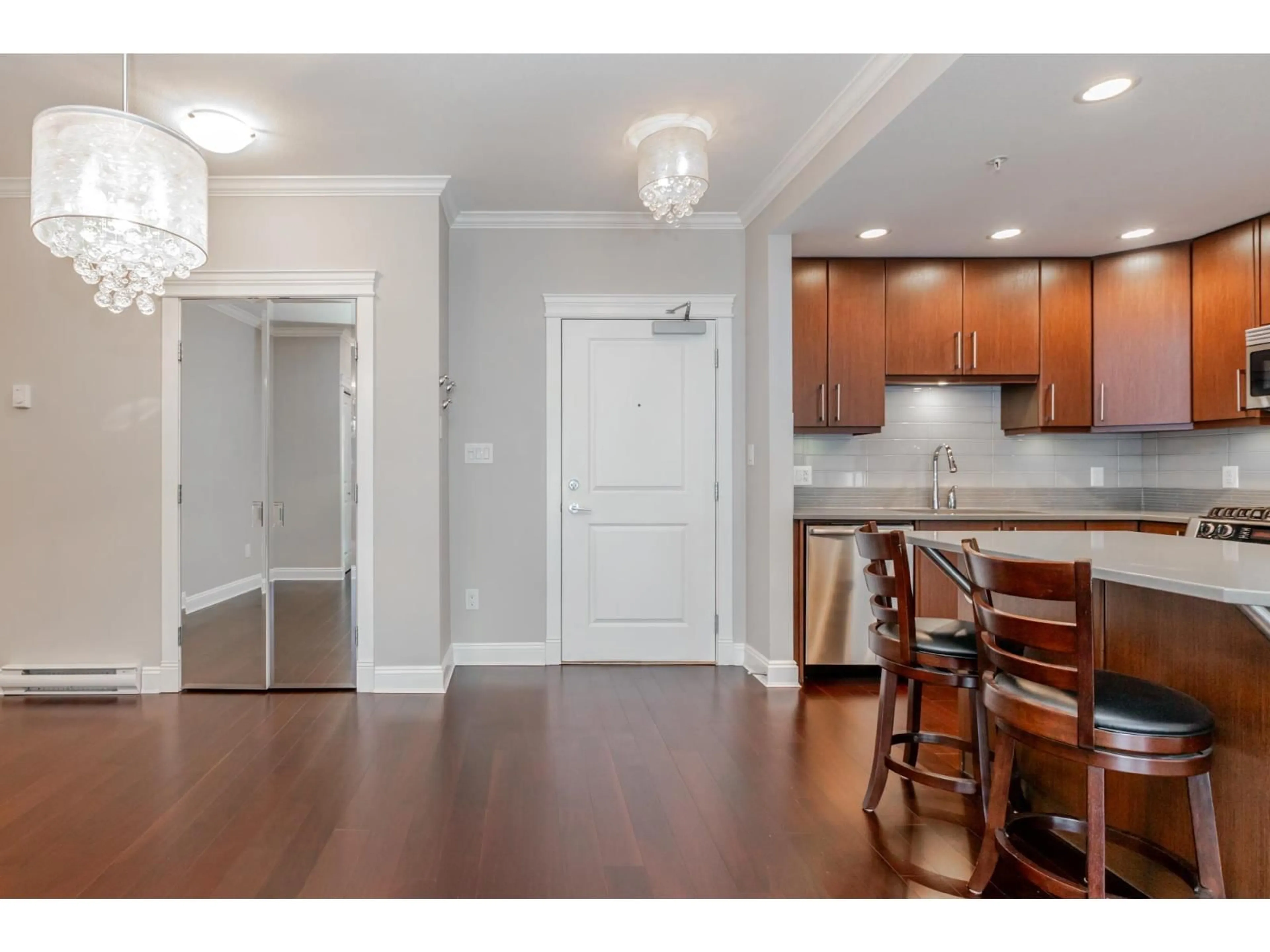 Open concept kitchen, wood/laminate floor for 105 - 15336 17A, Surrey British Columbia V4A1V3