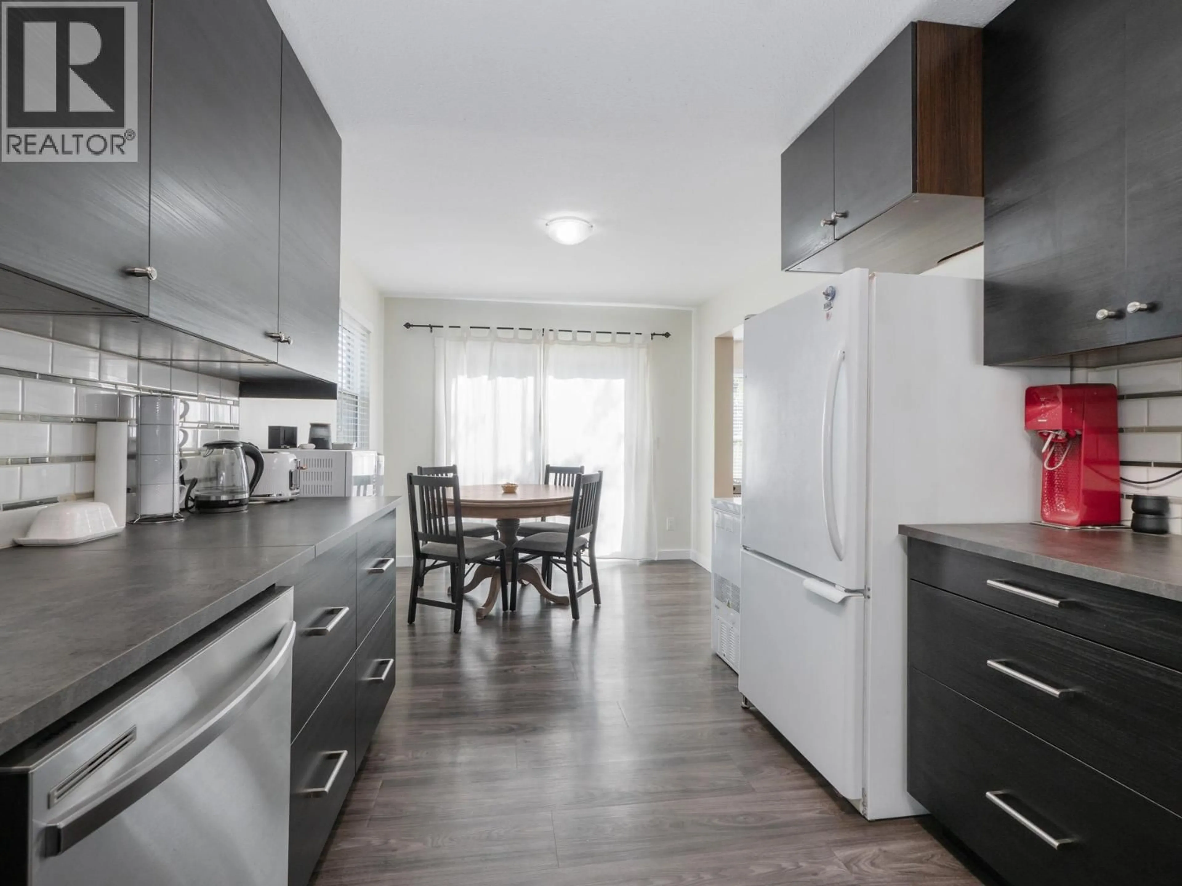 Open concept kitchen, wood/laminate floor for 1 - 765 SCHOOL ROAD, Gibsons British Columbia V0N1V9