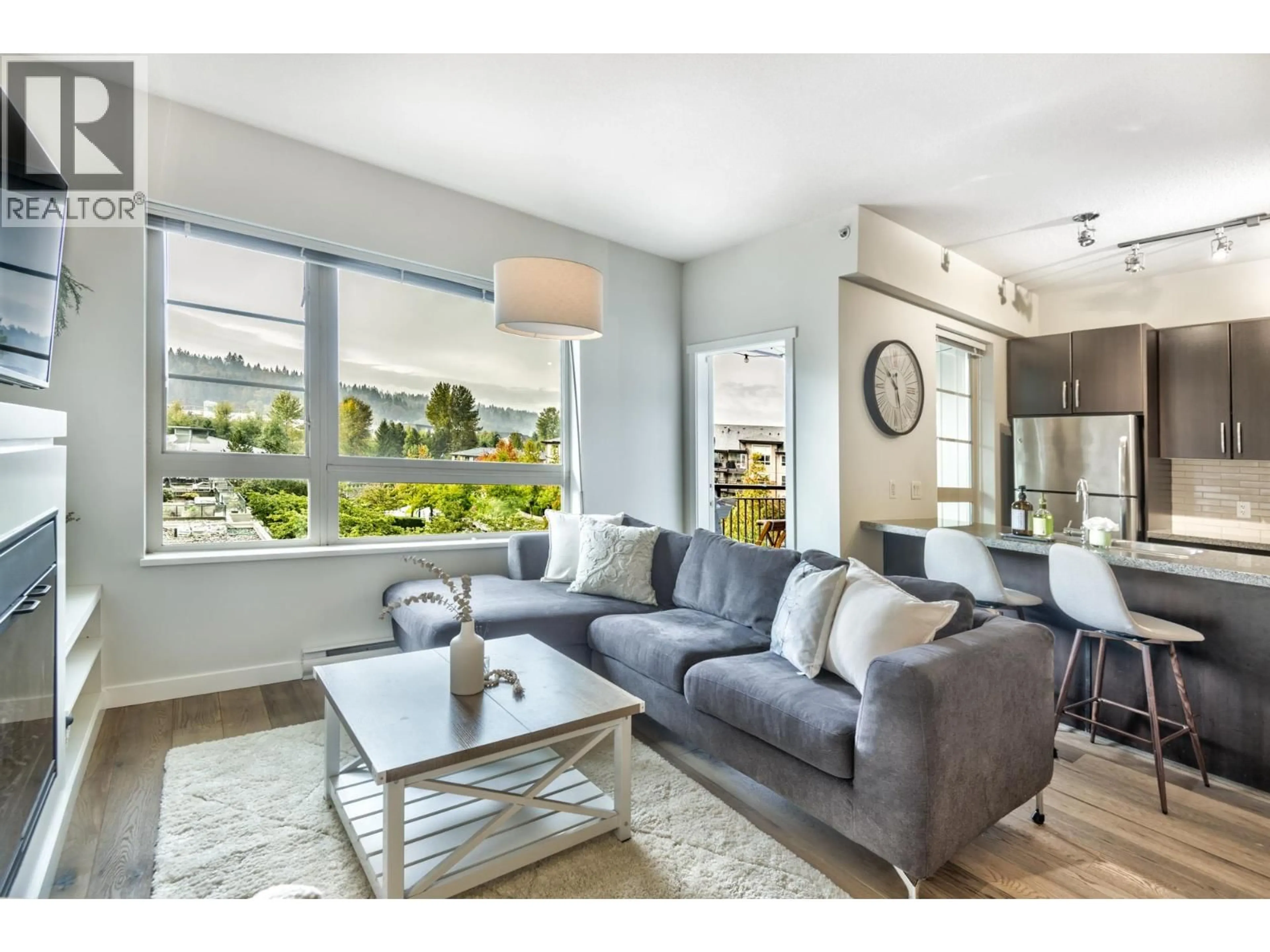 Living room with furniture, unknown for 410 - 701 KLAHANIE DRIVE, Port Moody British Columbia V3H5L6