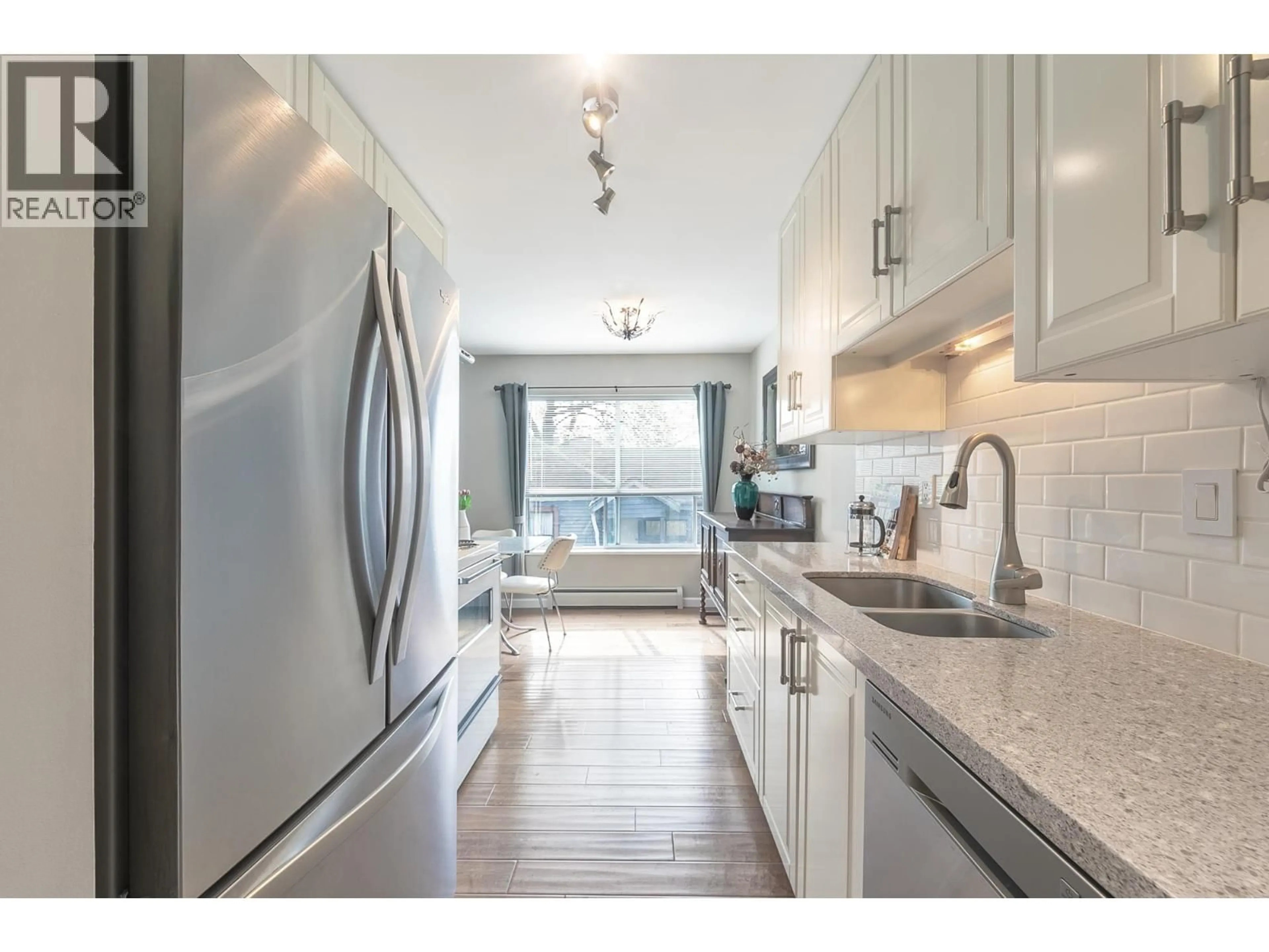 Open concept kitchen, unknown for 213 - 230 MOWAT STREET, New Westminster British Columbia V3M4B2