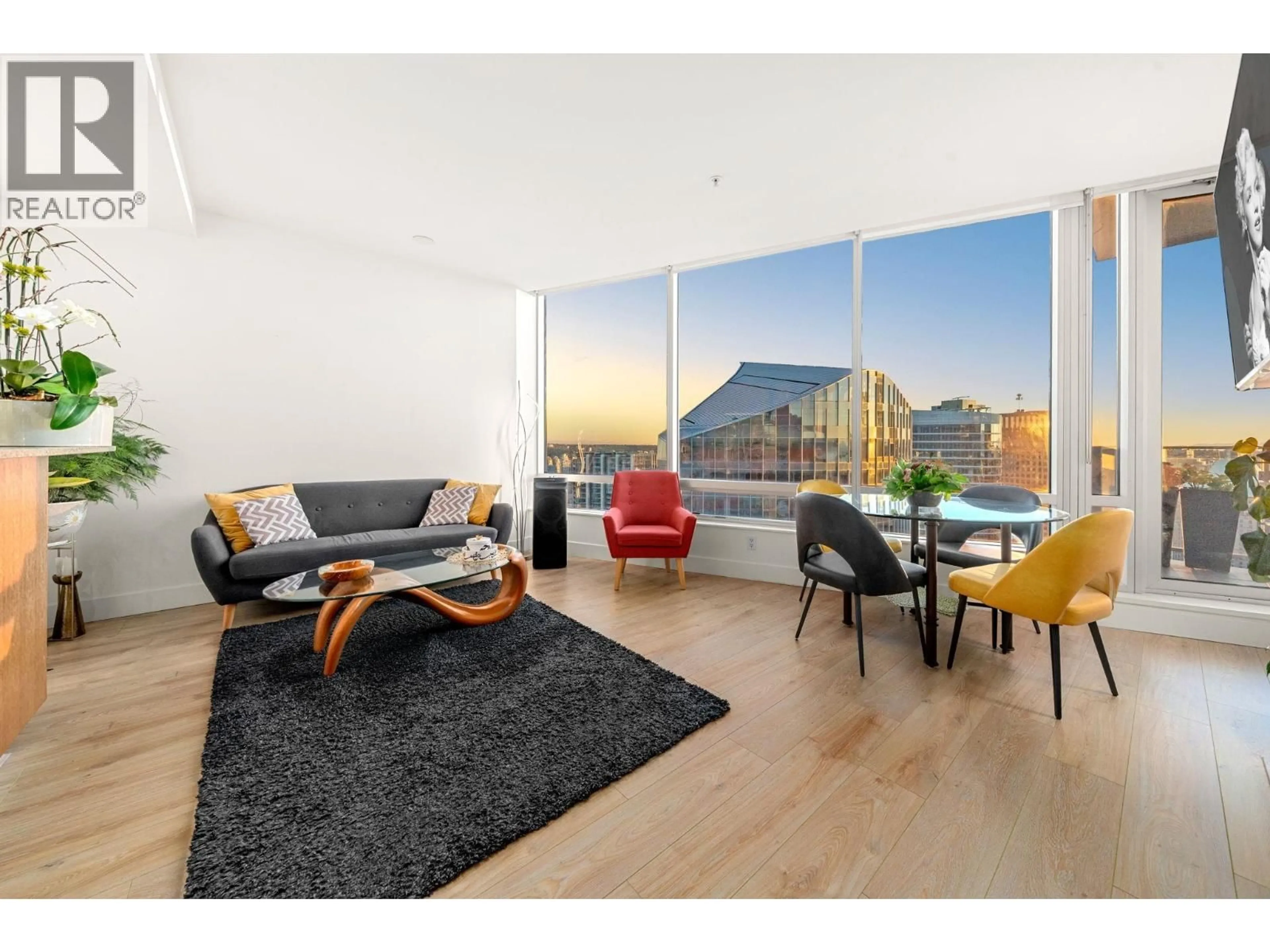 Living room with furniture, wood/laminate floor for 4006 - 1077 CORDOVA STREET, Vancouver British Columbia V6C2C6