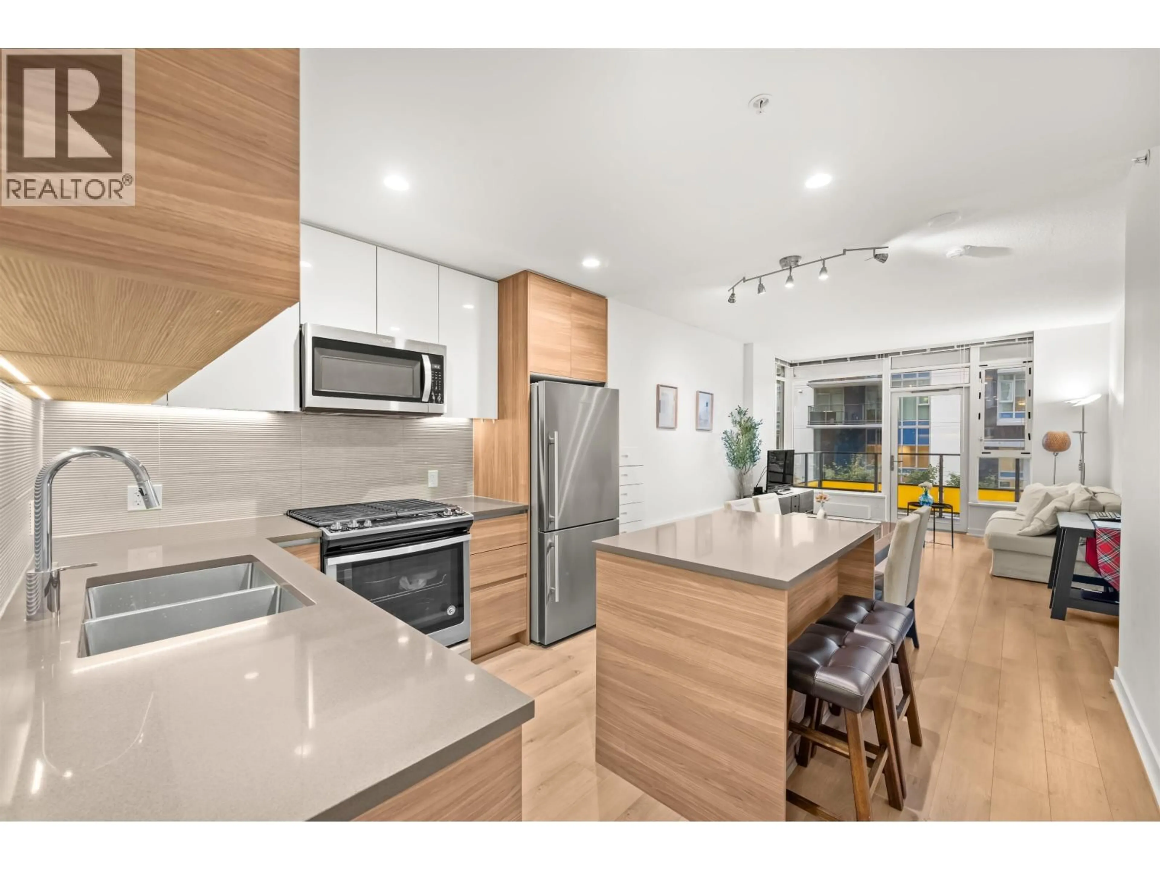 Open concept kitchen, unknown for 207 - 8850 UNIVERSITY CRESCENT, Burnaby British Columbia V5A0C8