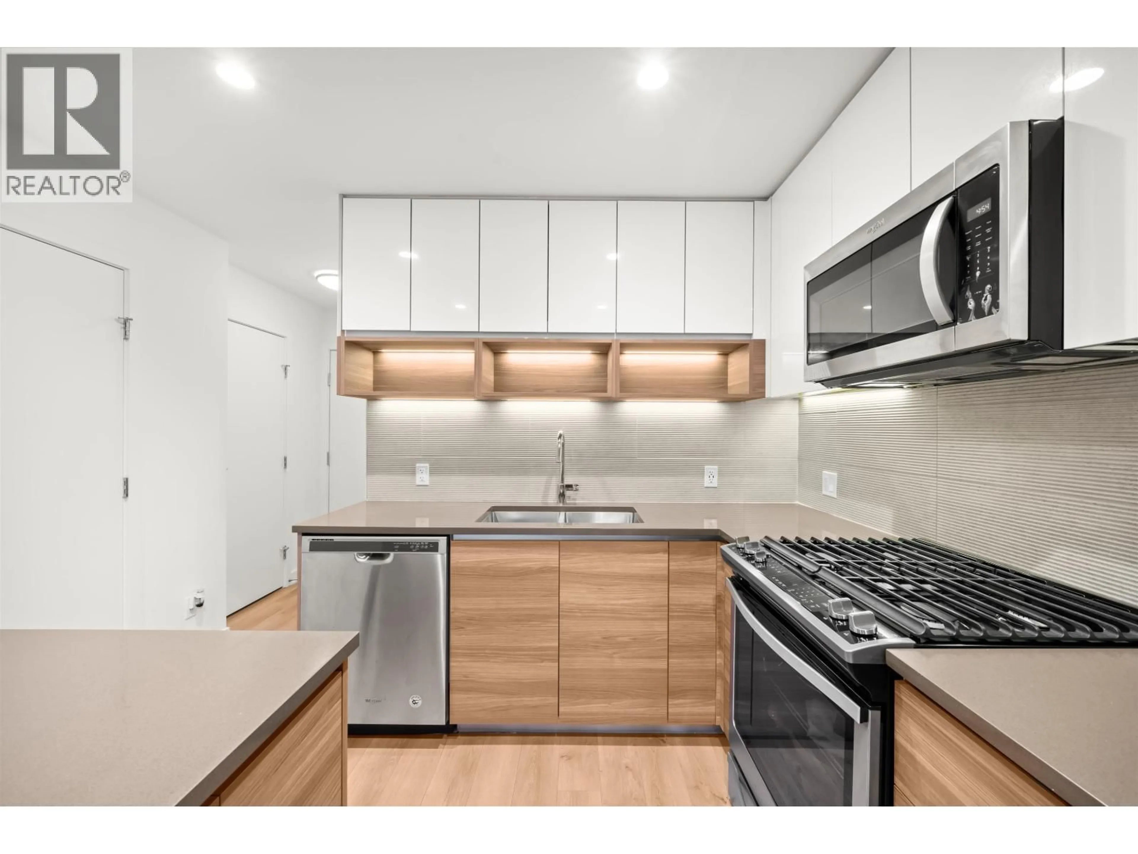 Standard kitchen, wood/laminate floor for 207 - 8850 UNIVERSITY CRESCENT, Burnaby British Columbia V5A0C8