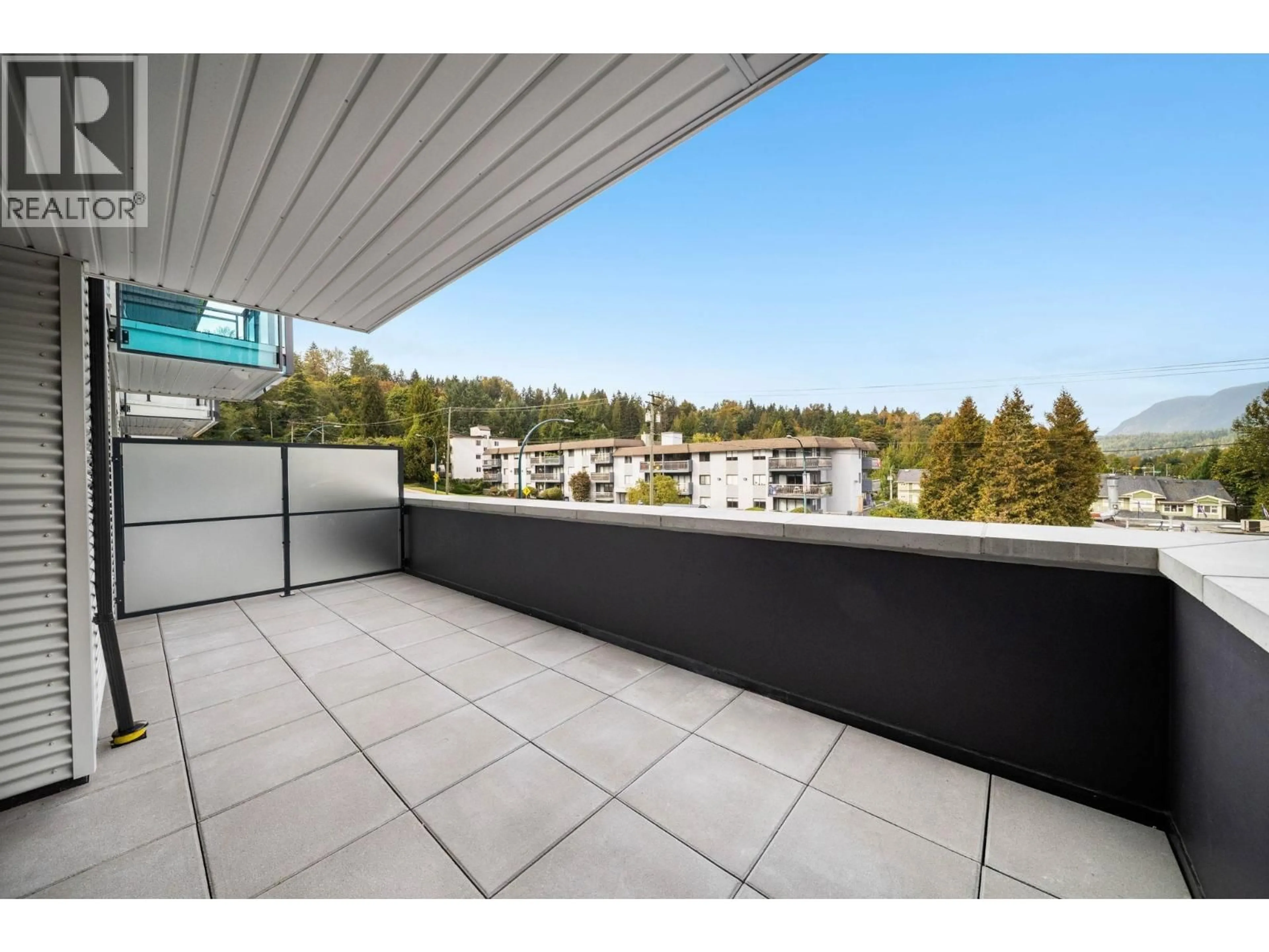 Balcony in the apartment, city buildings view from balcony for 213 - 2015 ST. JOHNS STREET, Port Moody British Columbia V3H0N5
