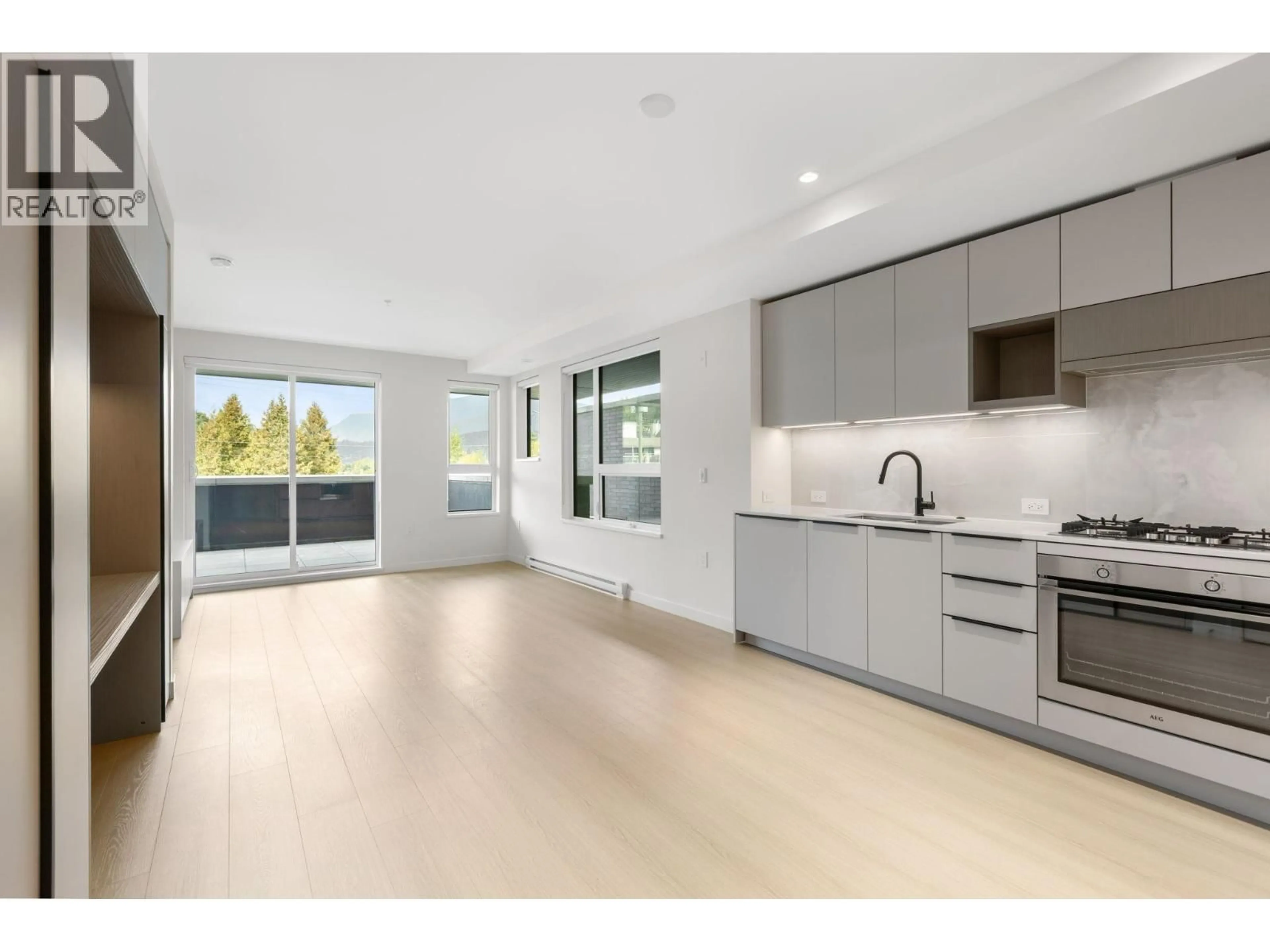 Open concept kitchen, unknown for 213 - 2015 ST. JOHNS STREET, Port Moody British Columbia V3H0N5
