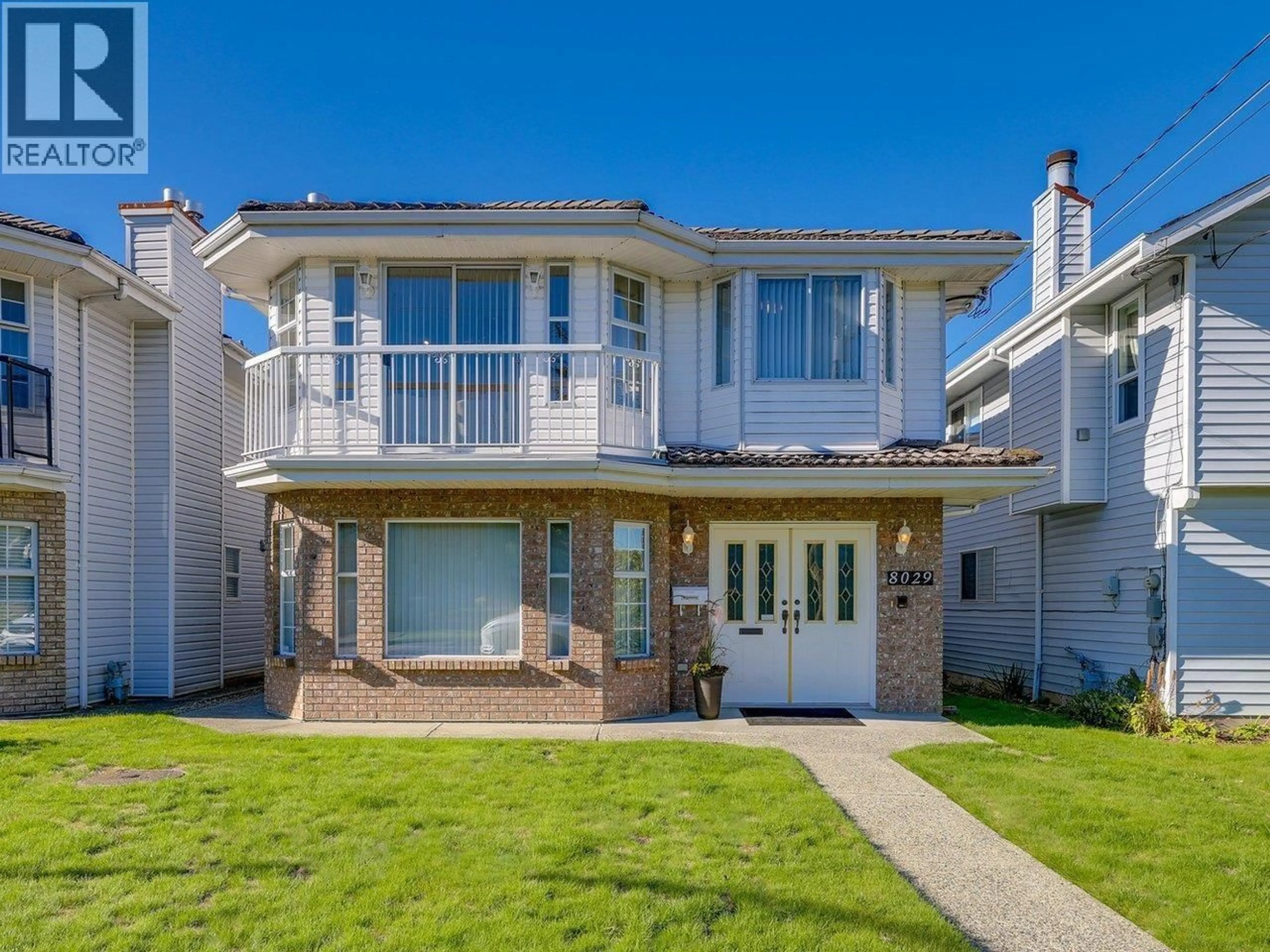 Home with vinyl exterior material, street for 8029 15TH AVENUE, Burnaby British Columbia V3N1X3