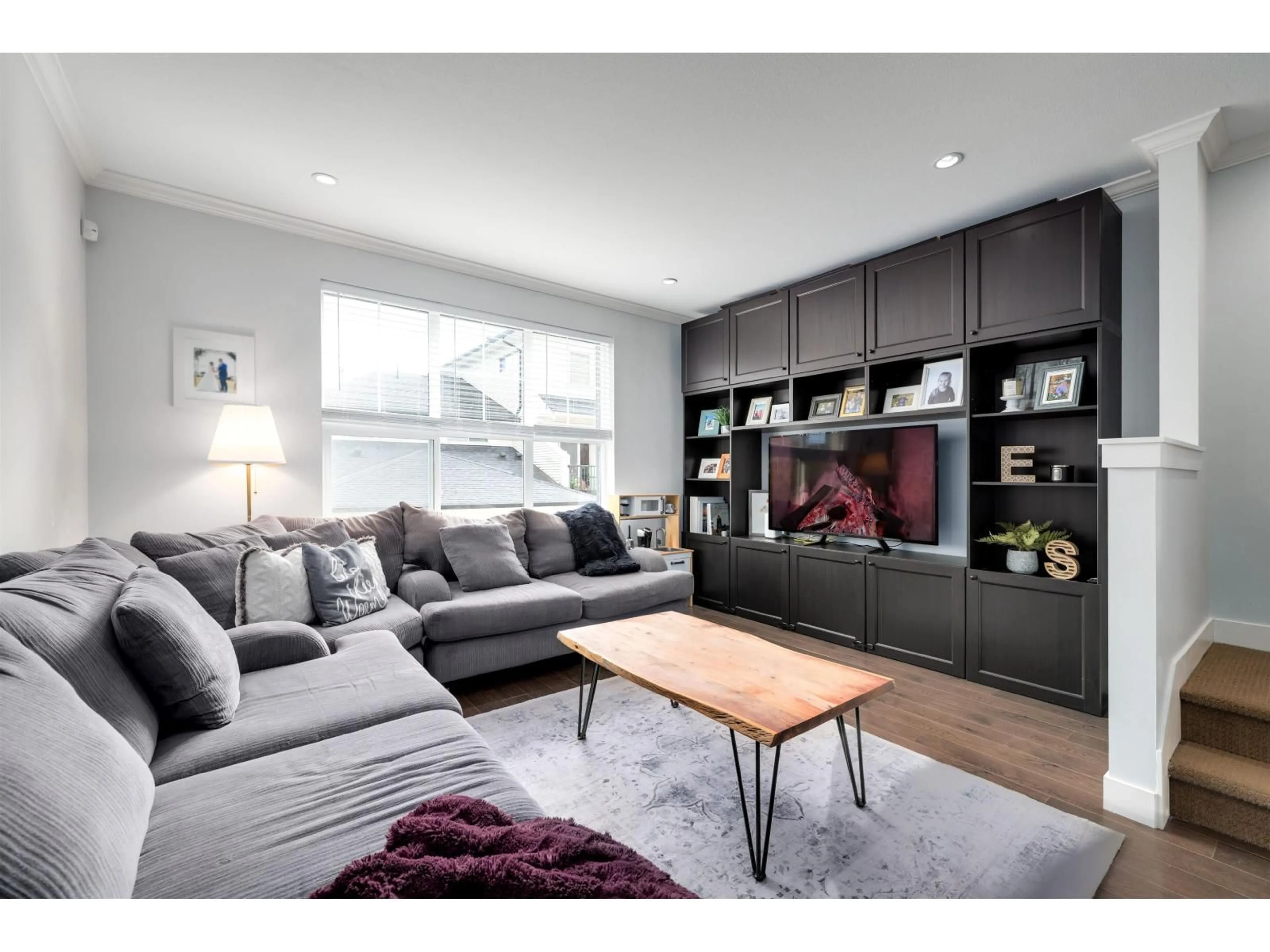 Living room with furniture, wood/laminate floor for 38 - 2469 164, Surrey British Columbia V3Z3T4