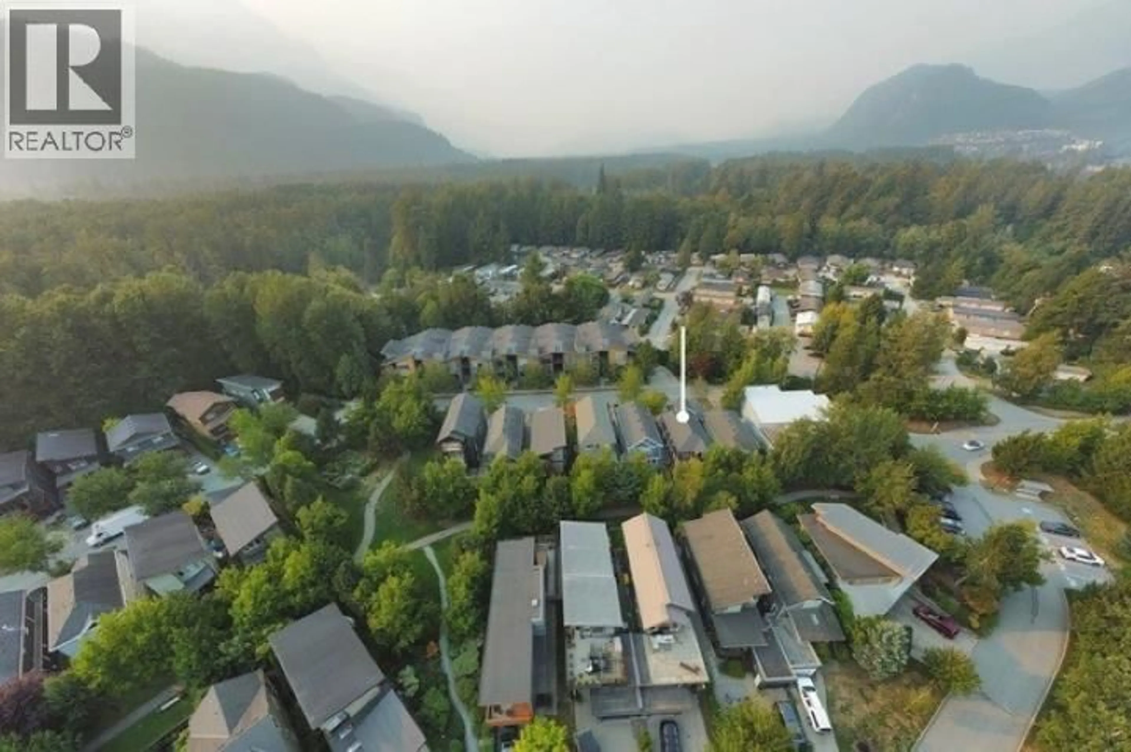 A pic from outside/outdoor area/front of a property/back of a property/a pic from drone, mountain view for 3 - 40137 GOVERNMENT ROAD, Squamish British Columbia V8B0N7