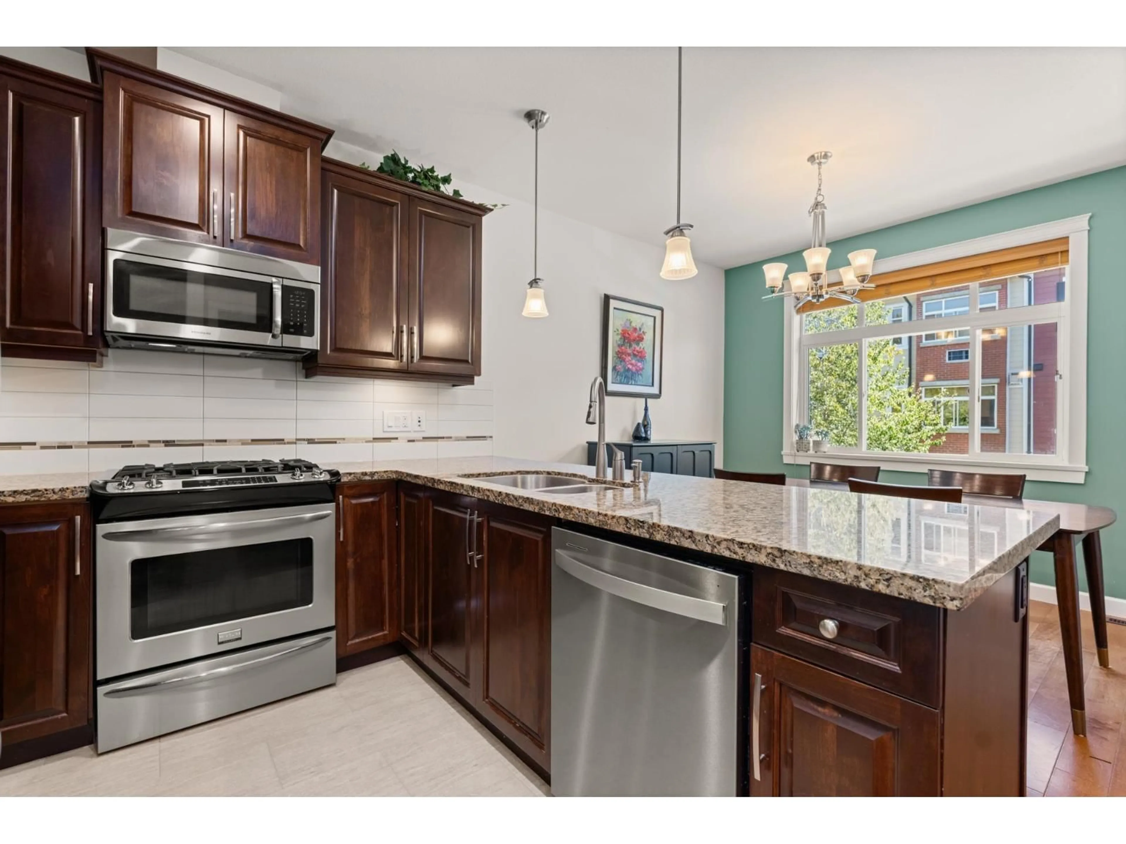 Open concept kitchen, ceramic/tile floor for 93 - 8068 207, Langley British Columbia V2Y0M9